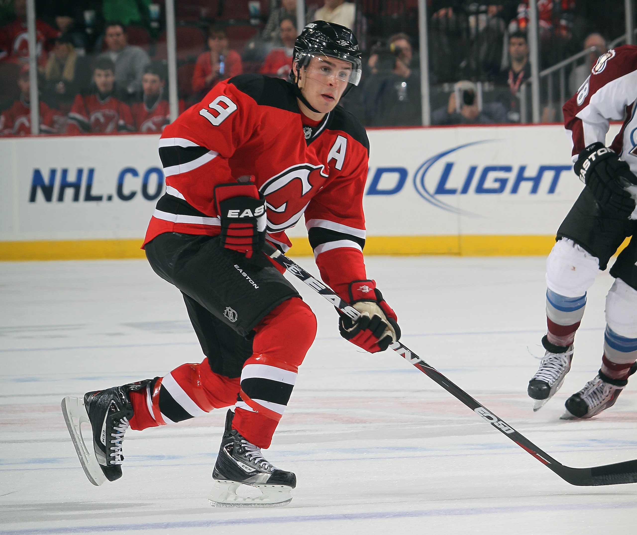 NEWARK, NJ - OCTOBER 15:  Zach Parise #9 of the New Jersey Devils skates against the Colorado Avalanche at the Prudential Center on October 15, 2010 in Newark, New Jersey.  (Photo by Bruce Bennett/Getty Images)
