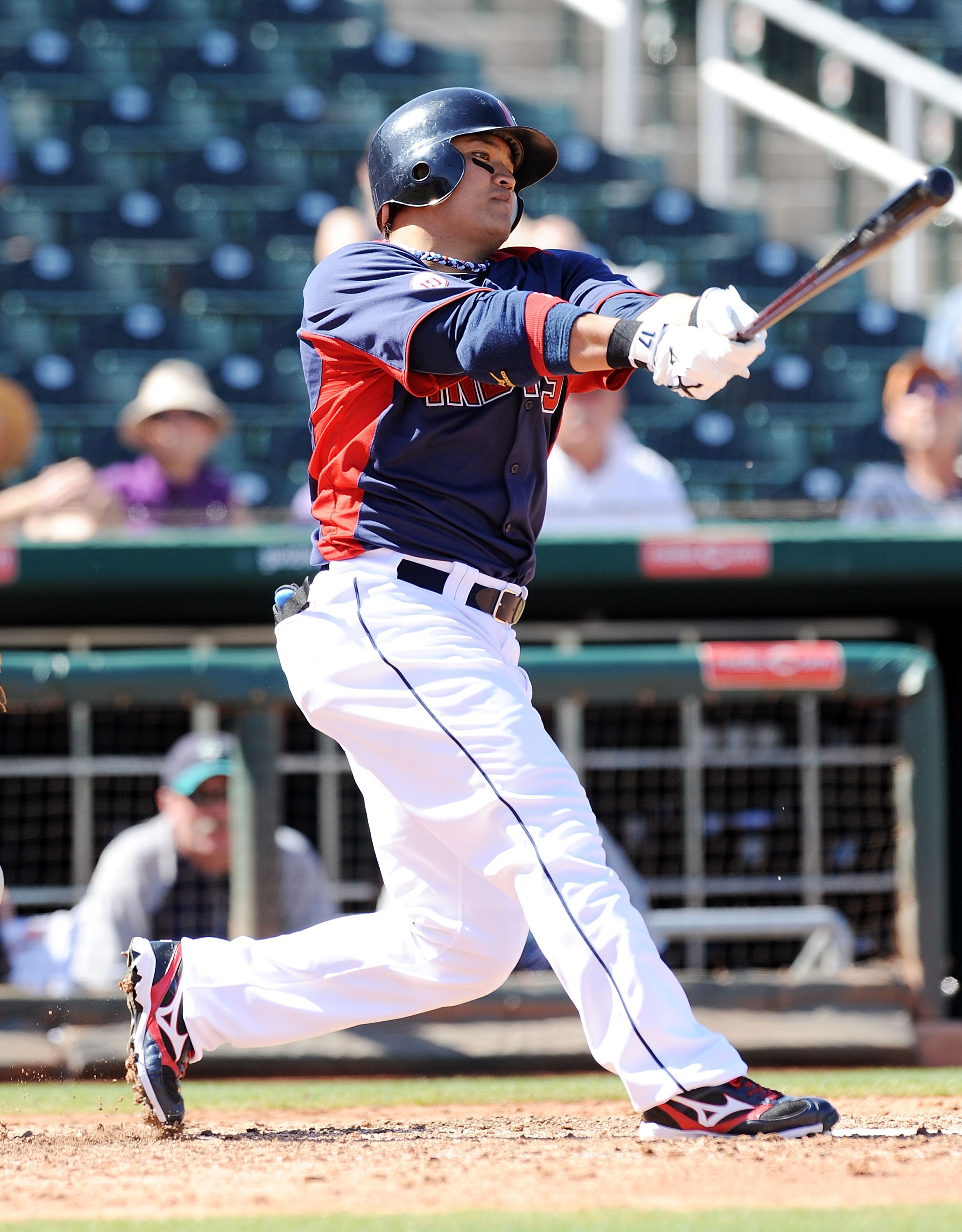 GOODYEAR, AZ - MARCH 11:  Shin-Soo Choo #17 of the Cleveland Indians follows through on a swing against the Seattle Mariners at Goodyear Ballpark on March 11, 2011 in Goodyear, Arizona.  (Photo by Norm Hall/Getty Images)