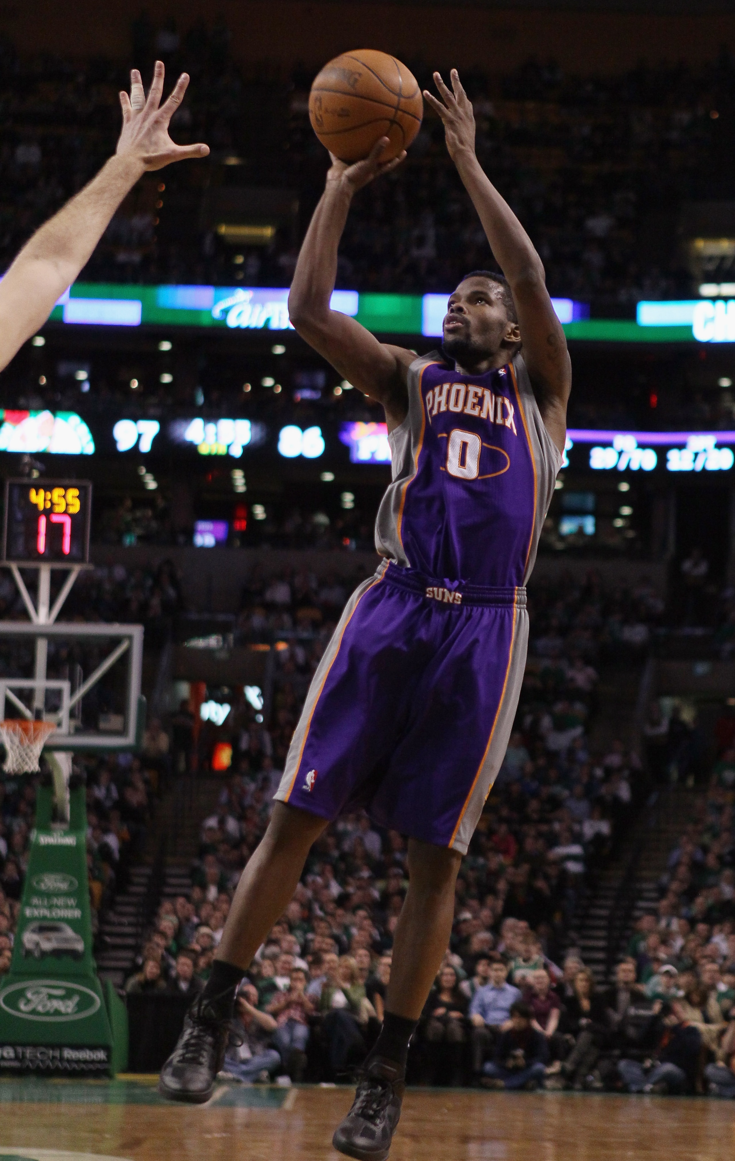 BOSTON, MA - MARCH 02:  Aaron Brooks #0 of the Phoenix Suns takes a shot in the second half against the Boston Celtics on March 2, 2011 at the TD Garden in Boston, Massachusetts.  The Celtics defeated the Suns 115-103. NOTE TO USER: User expressly acknowl