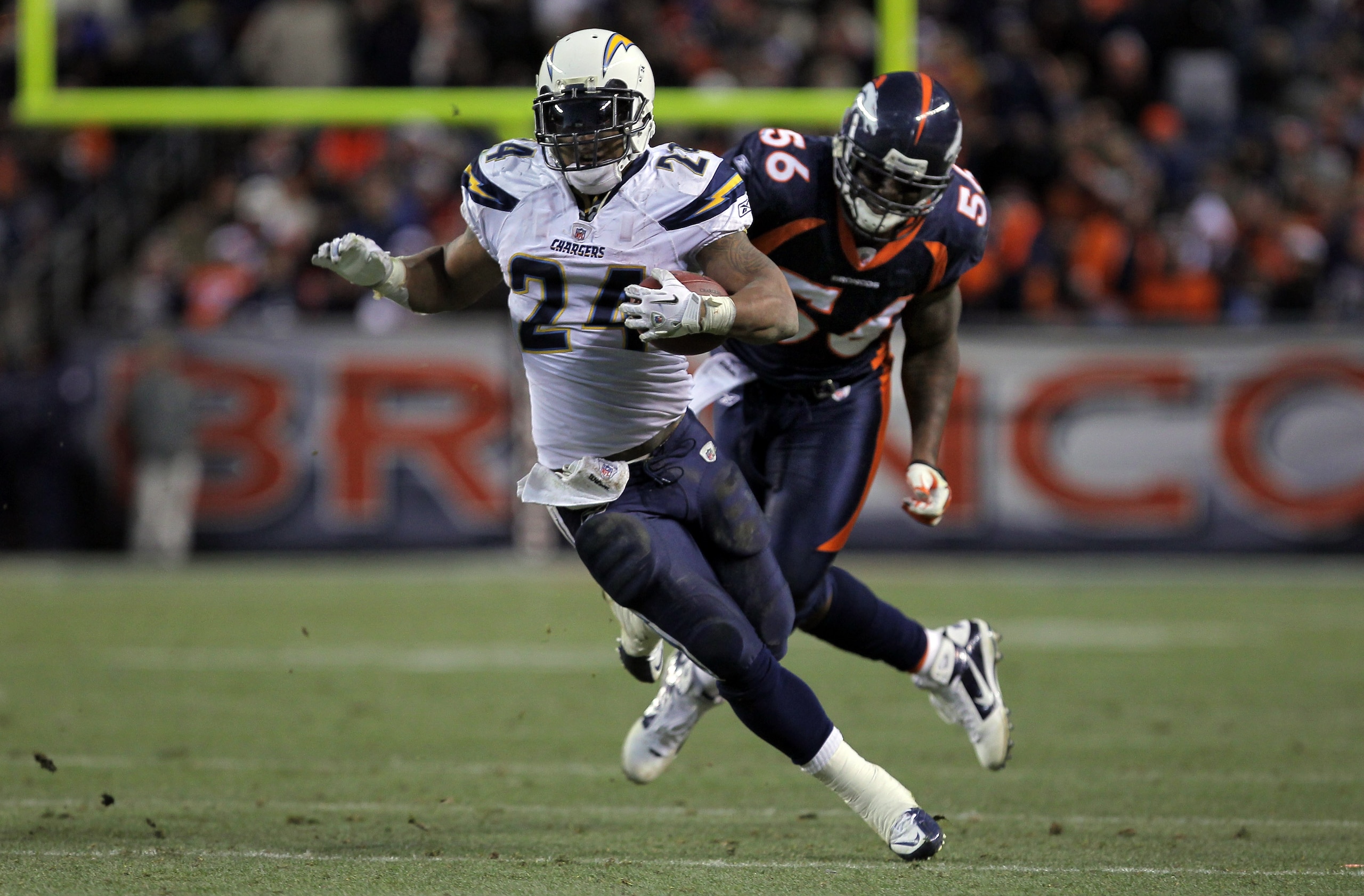 DENVER - JANUARY 02: Running back Ryan Mathews #24 of the San Diego Chargers eludes linebacker Robert Ayers #56 of the Denver Broncos as he rushes for a 31 yard touchdown on fourth down and one yard to go in the fourth quarter at INVESCO Field at Mile Hi DENVER - JANUARY 02: Running back Ryan Mathews #24 of the San Diego Chargers eludes linebacker Robert Ayers #56 of the Denver Broncos as he rushes for a 31 yard touchdown on fourth down and one yard to go in the fourth quarter at INVESCO Field at Mile Hi