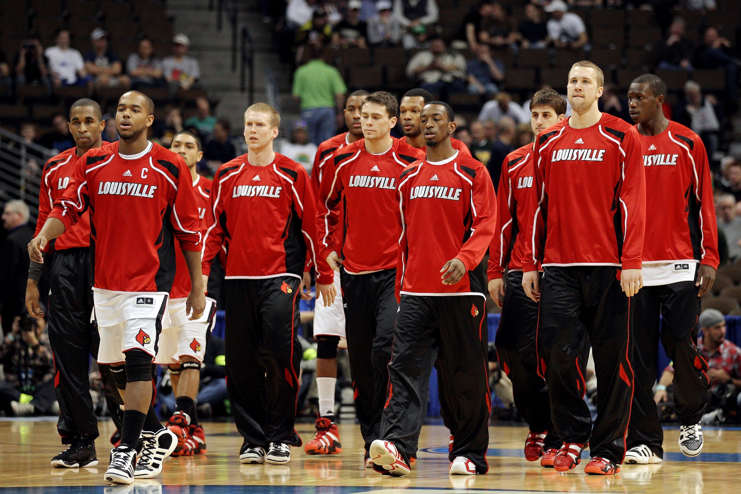 DENVER, CO - MARCH 17: The Louisville Cardinals walk on the court prior to playing against the Morehead State Eagles in the second round of the 2011 NCAA men's basketball tournament at Pepsi Center on March 17, 2011 in Denver, Colorado. (Photo by Justin DENVER, CO - MARCH 17: The Louisville Cardinals walk on the court prior to playing against the Morehead State Eagles in the second round of the 2011 NCAA men's basketball tournament at Pepsi Center on March 17, 2011 in Denver, Colorado. (Photo by Justin