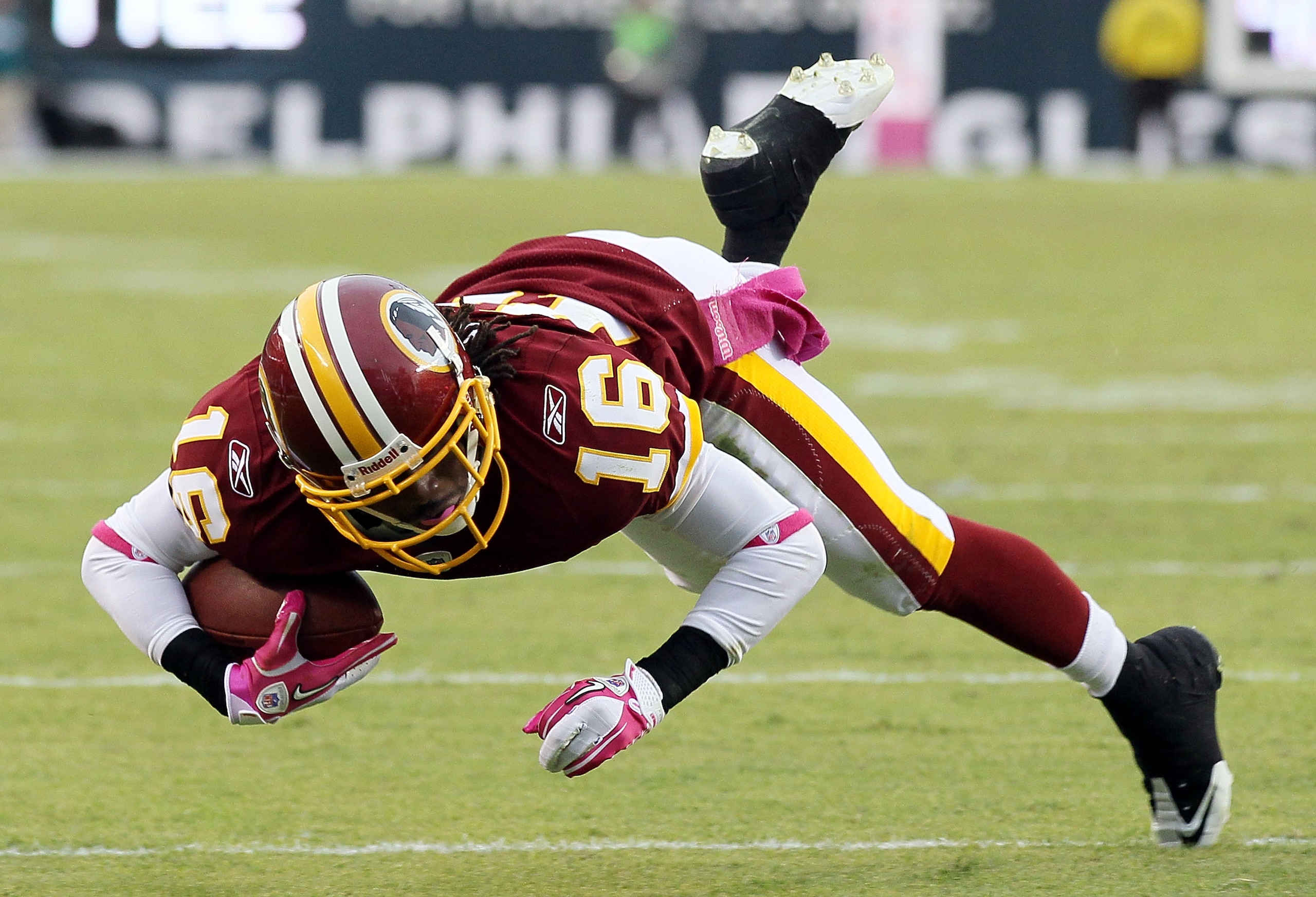 PHILADELPHIA - OCTOBER 03:  Brandon Banks #16 of the Washington Redskins is tripped up during the first half against the Philadelphia Eagles on October 3, 2010 at Lincoln Financial Field in Philadelphia, Pennsylvania.  (Photo by Jim McIsaac/Getty Images)