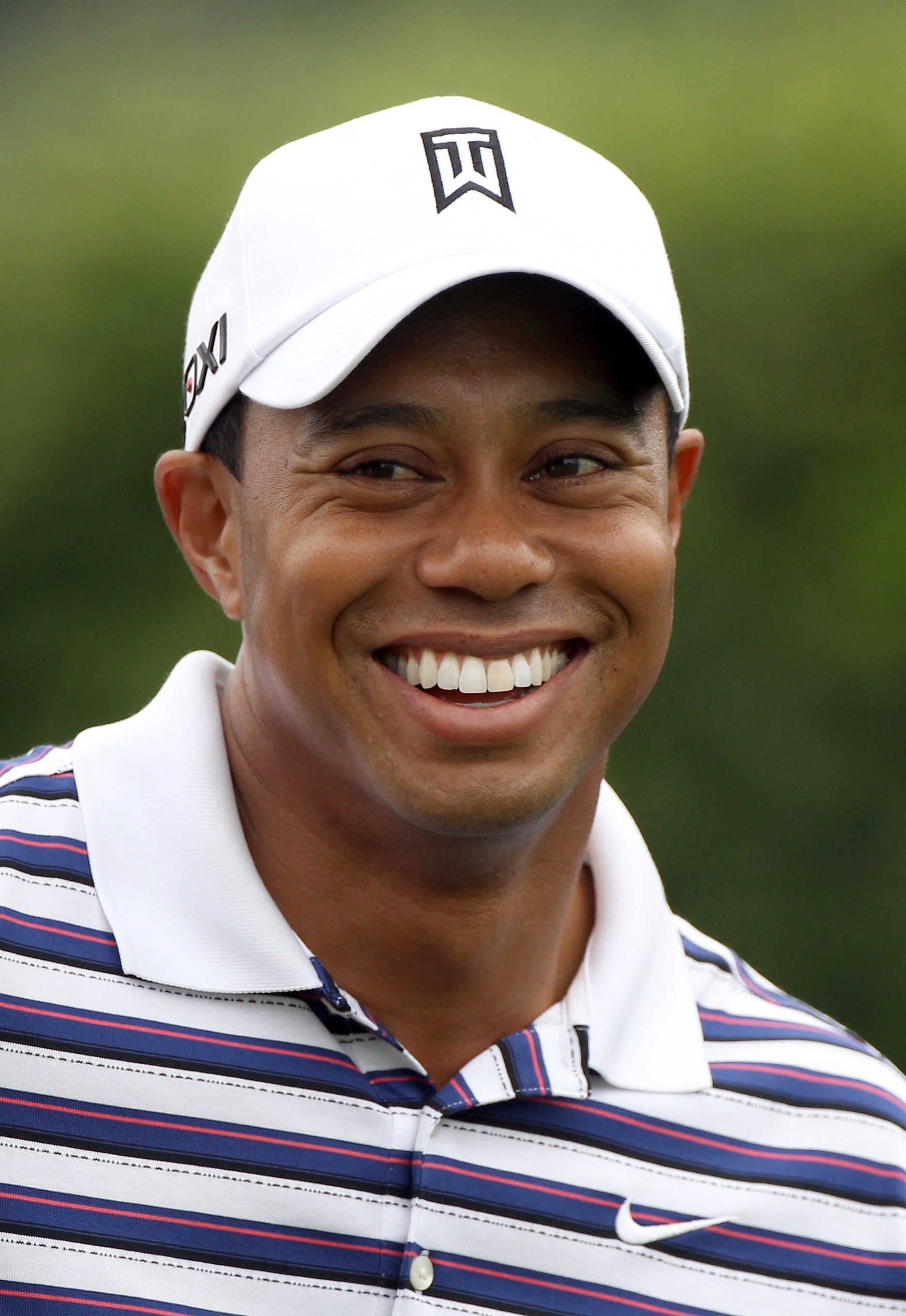 ORLANDO, FL - MARCH 23:  Tiger Woods smiles during the pro-am round prior to the Arnold Palmer Invitational presented by MasterCard at the Bay Hill Club and Lodge on March 23, 2011 in Orlando, Florida.  (Photo by Sam Greenwood/Getty Images)