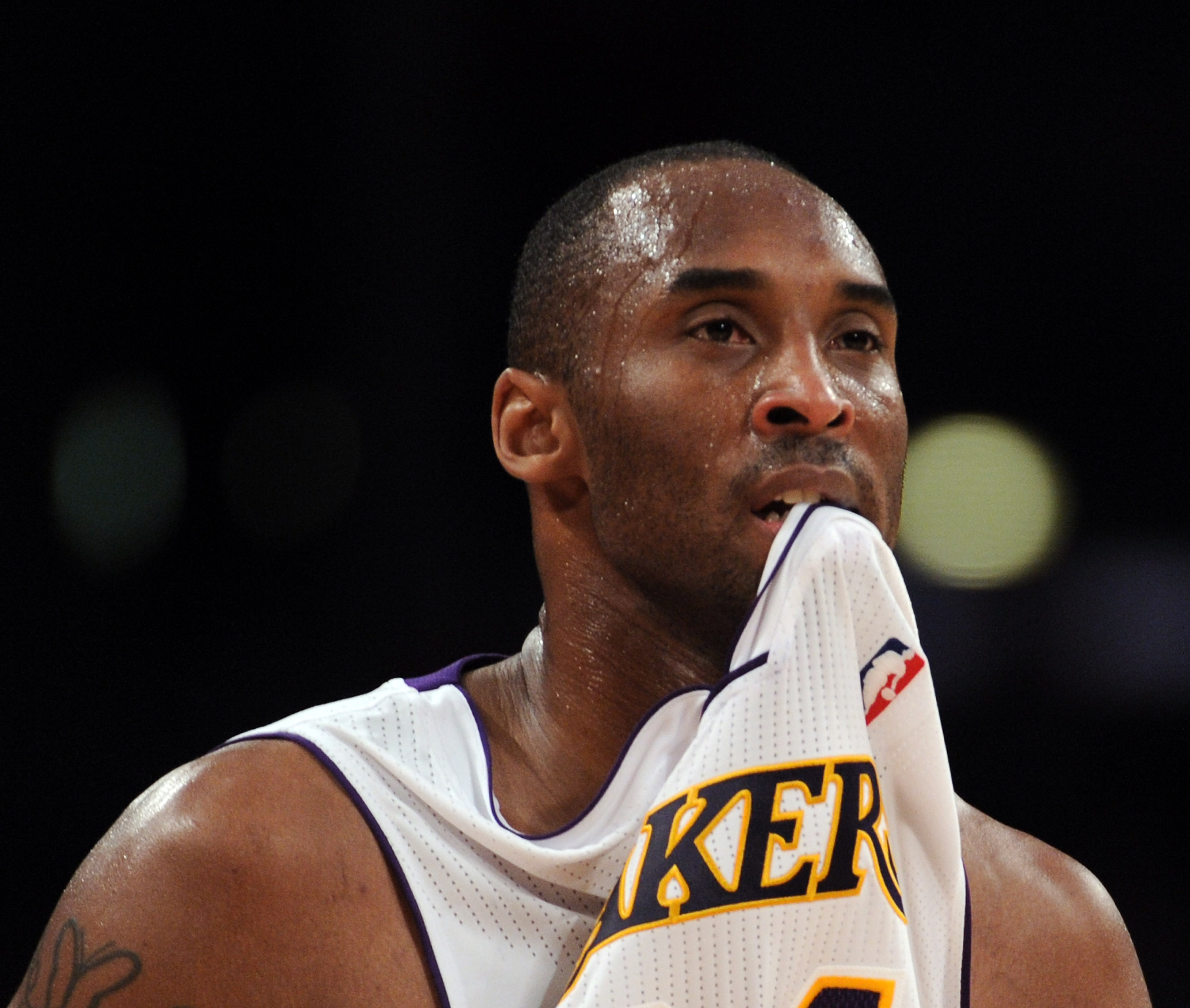 LOS ANGELES, CA - MARCH 20:  Kobe Bryant #24 of the Los Angeles Lakers watches play while biting his jersey against the  Portland Trail Blazers at the Staples Center on March 20, 2011 in Los Angeles, California.  NOTE TO USER: User expressly acknowledges