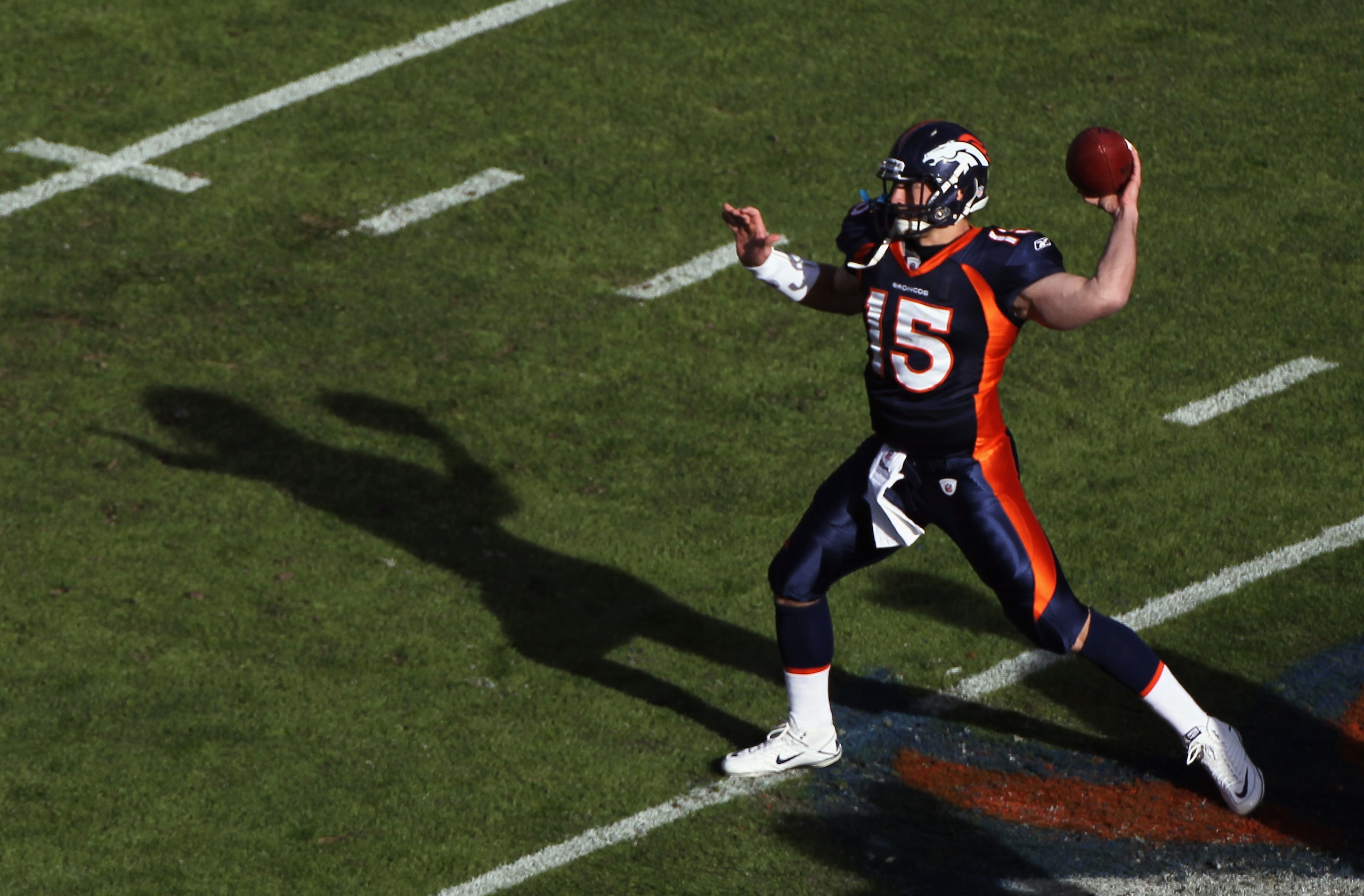 DENVER - DECEMBER 26:  Quarterback Tim Tebow #15 of the Denver Broncos warms up prior to facing the Houston Texas at INVESCO Field at Mile High on December 26, 2010 in Denver, Colorado. The Broncos defeated the Texans 24-23.  (Photo by Doug Pensinger/Gett