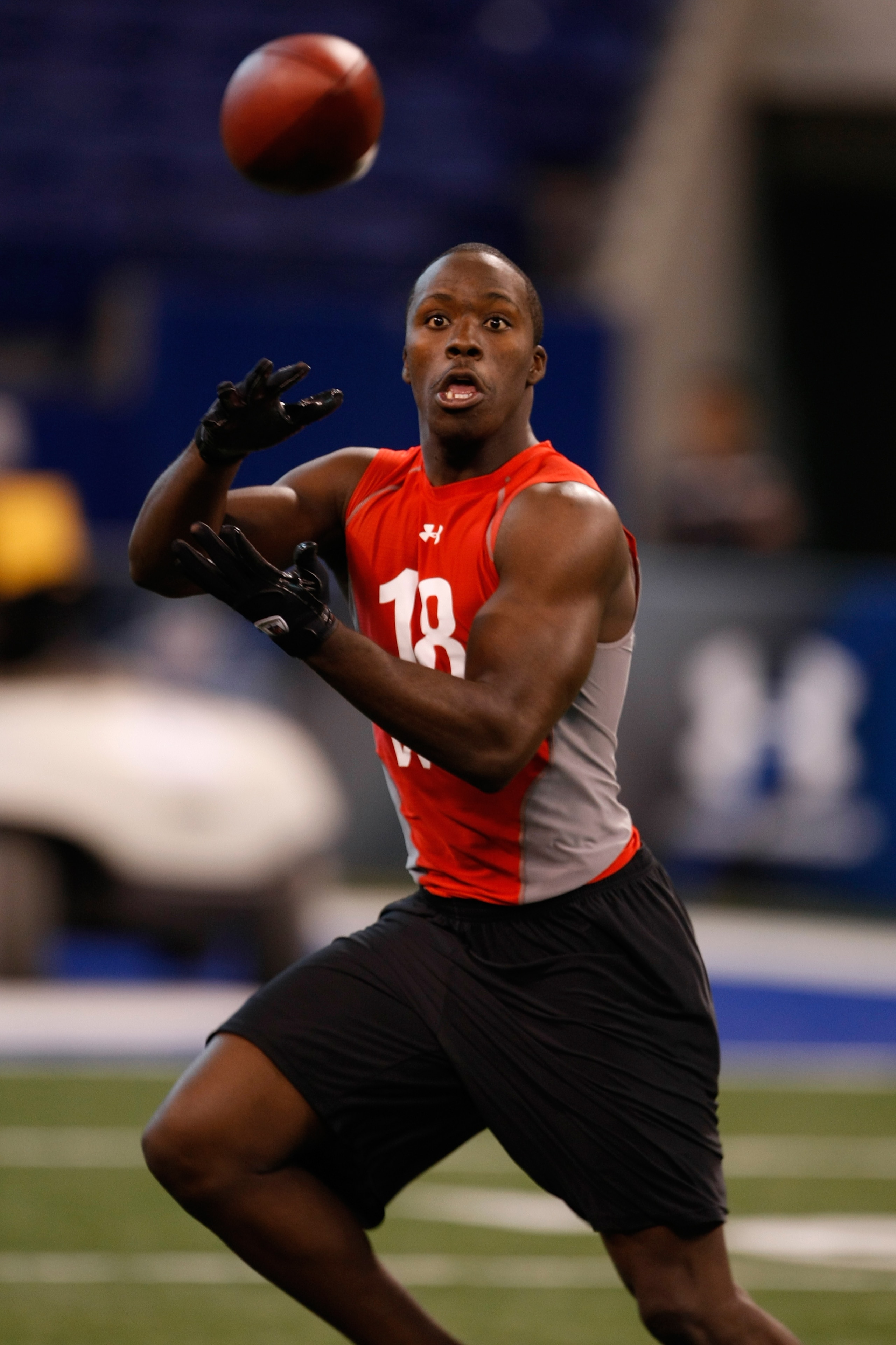 INDIANAPOLIS, IN - FEBRUARY 22:  Wide receiver Taurus Johnson of South Florida catches the football during the NFL Scouting Combine at Lucas Oil Stadium on February 22, 2009 in Indianapolis, Indiana. (Photo by Scott Boehm/Getty Images)