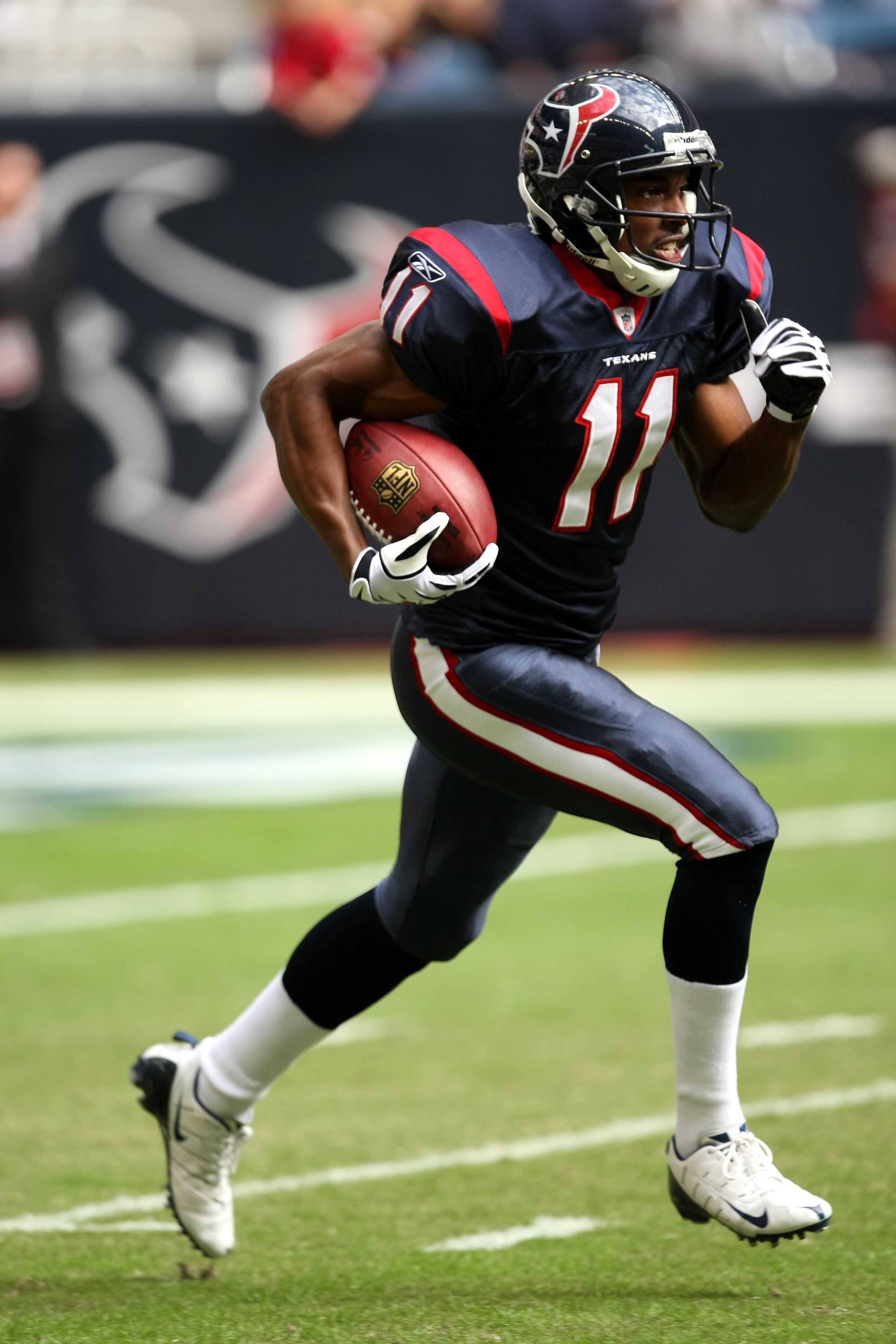 HOUSTON - NOVEMBER 29:  Wide receiver Andre Davis #11 of the Houston Texans returns a kickoff against the Indianapolis Colts on November 29, 2009  at Reliant Stadium in Houston, Texas. The Colts won 35-27.  (Photo by Stephen Dunn/Getty Images)