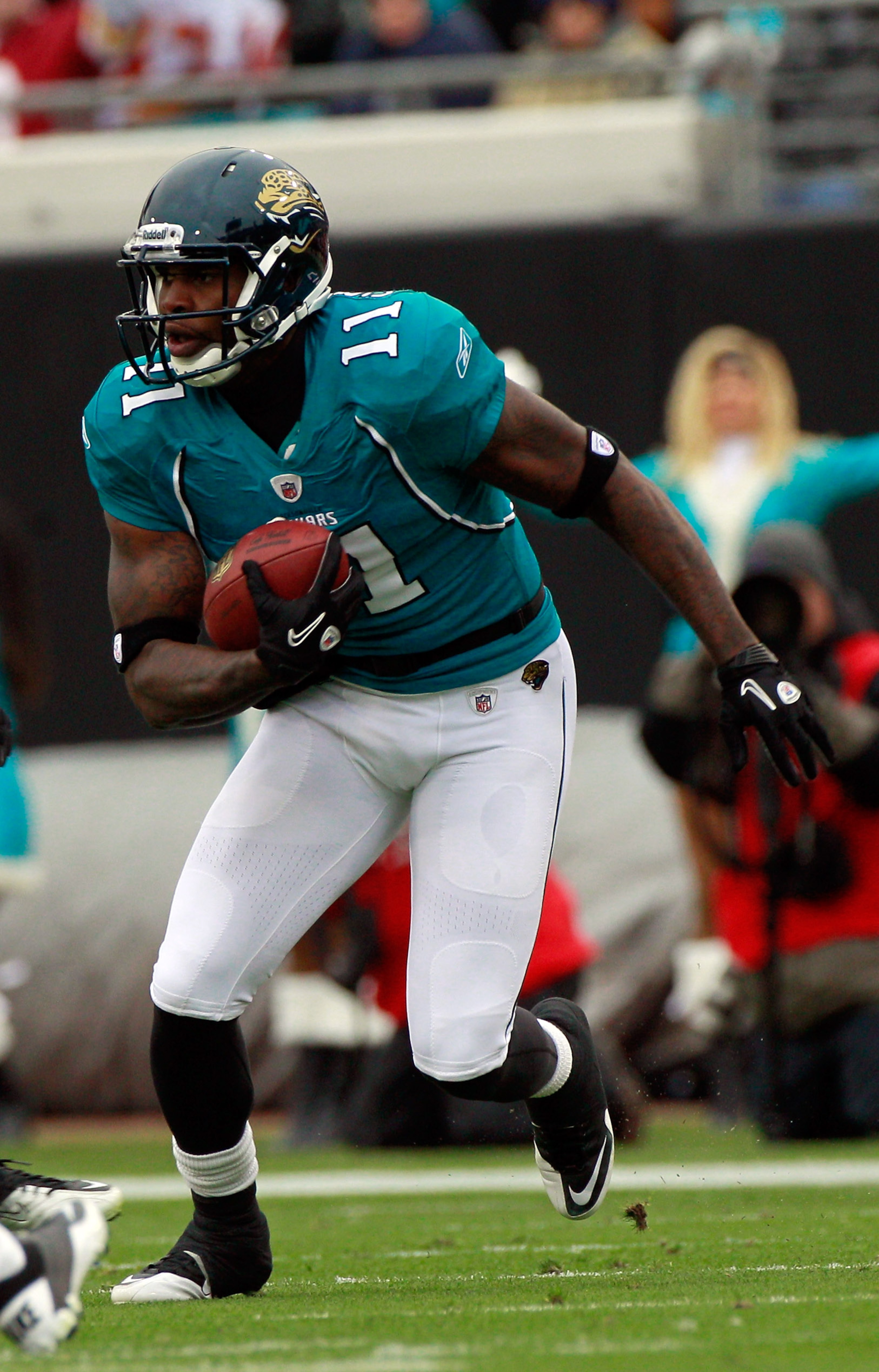 JACKSONVILLE, FL - DECEMBER 26:  Mike Sims-Walker #11 of the Jacksonville Jaguars runs after making a reception during the game against the Washington Redskins at EverBank Field on December 26, 2010 in Jacksonville, Florida.  (Photo by Sam Greenwood/Getty
