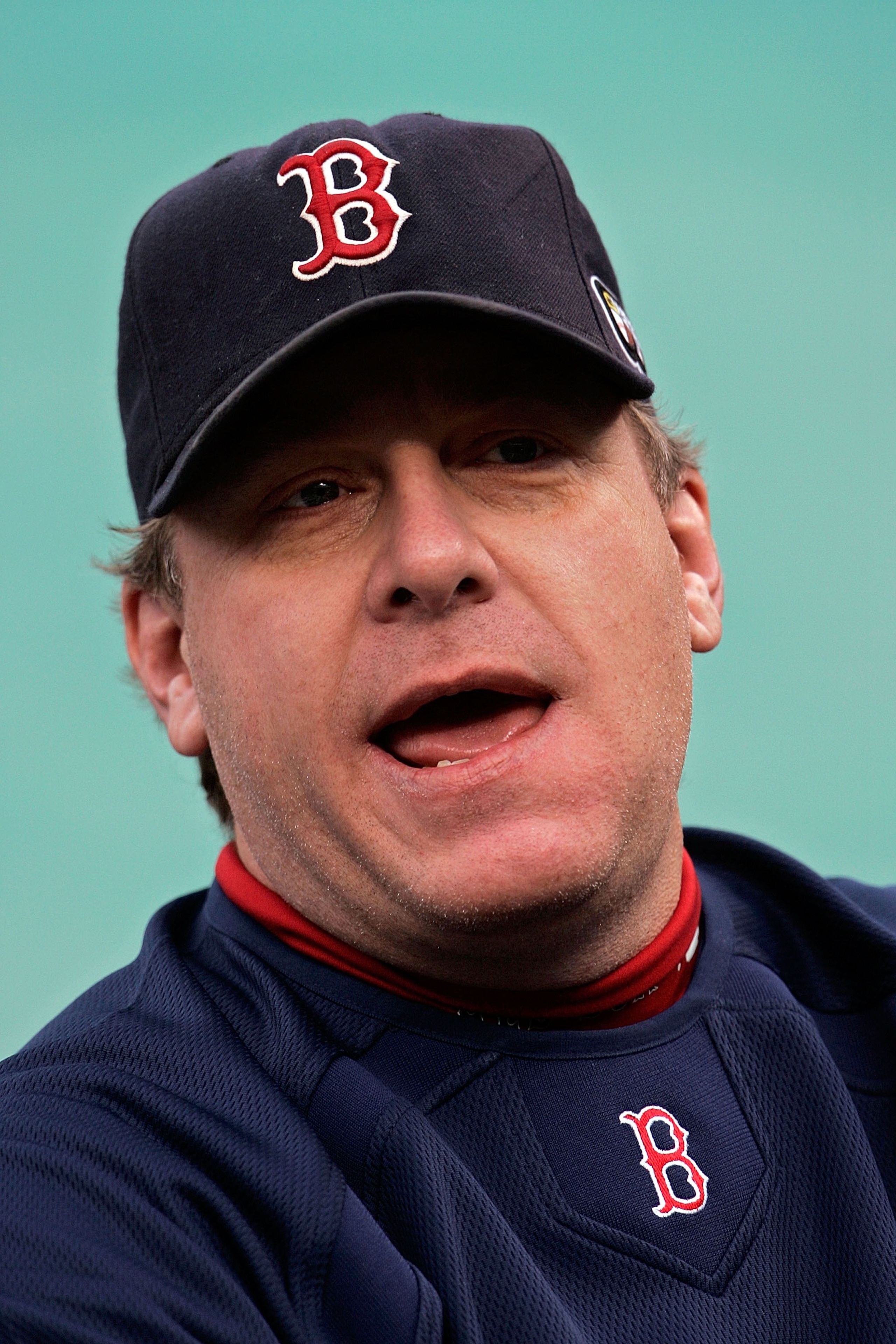DENVER - OCTOBER 27:  Curt Schilling #38 of the Boston Red Sox watches warm ups before Game Three of the 2007 Major League Baseball World Series against the Colorado Rockies at Coors Field on October 27, 2007 in Denver, Colorado.  (Photo by Jeff Gross/Get