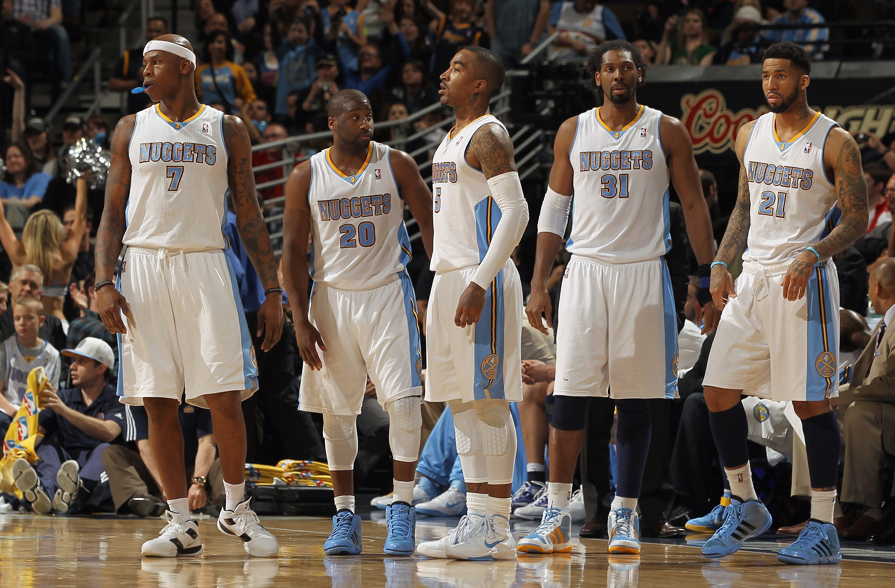 DENVER, CO - MARCH 23:  (L-R) Al Harrington #7, Raymond Felton #20, J.R. Smith #5, Nene #31 and Wilson Chandler #21 of the Denver Nuggets head back to the court after a time out against the San Antonio Spurs at the Pepsi Center on March 23, 2011 in Denver