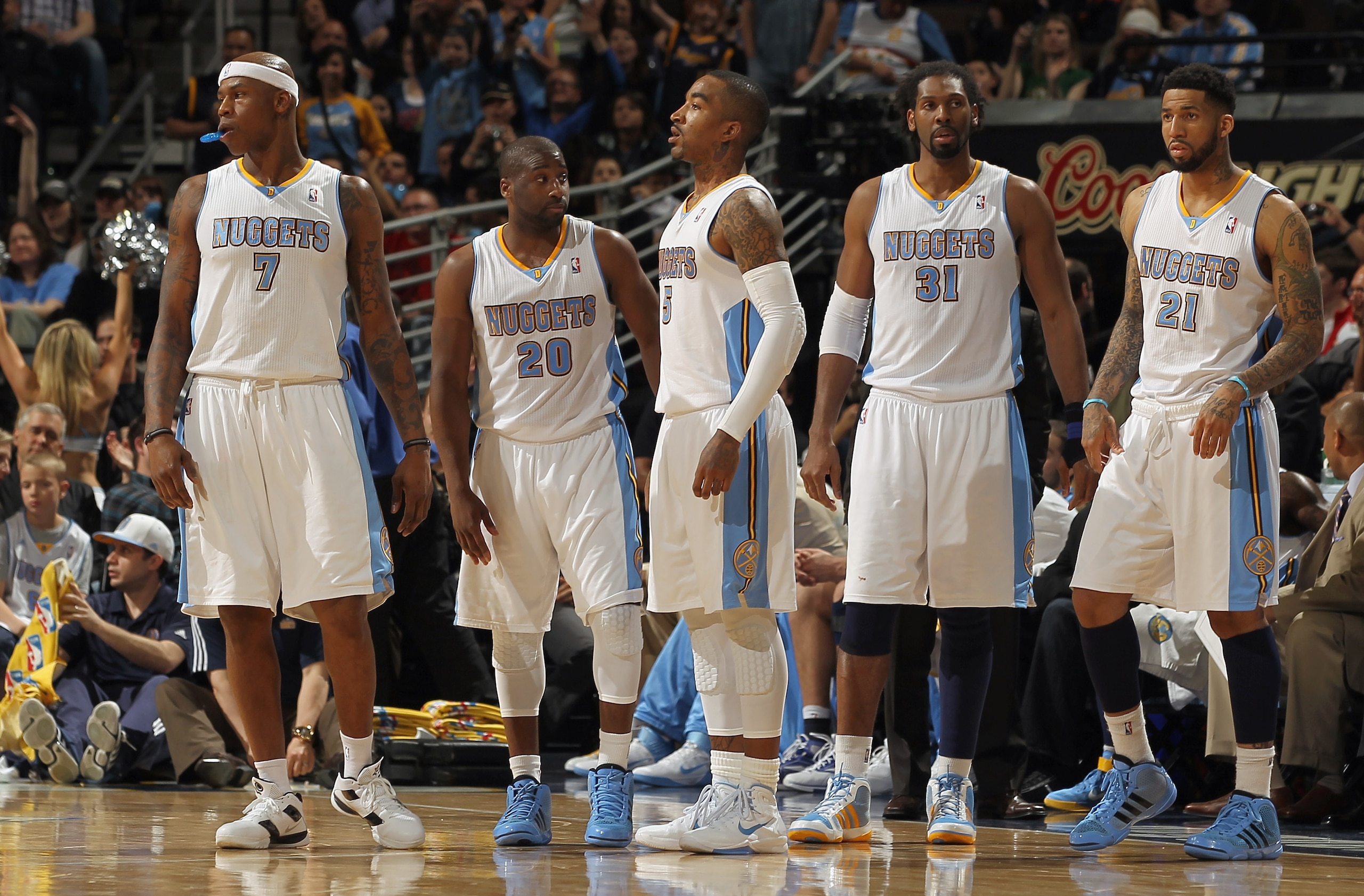DENVER, CO - MARCH 23:  (L-R) Al Harrington #7, Raymond Felton #20, J.R. Smith #5, Nene #31 and Wilson Chandler #21 of the Denver Nuggets head back to the court after a time out against the San Antonio Spurs at the Pepsi Center on March 23, 2011 in Denver