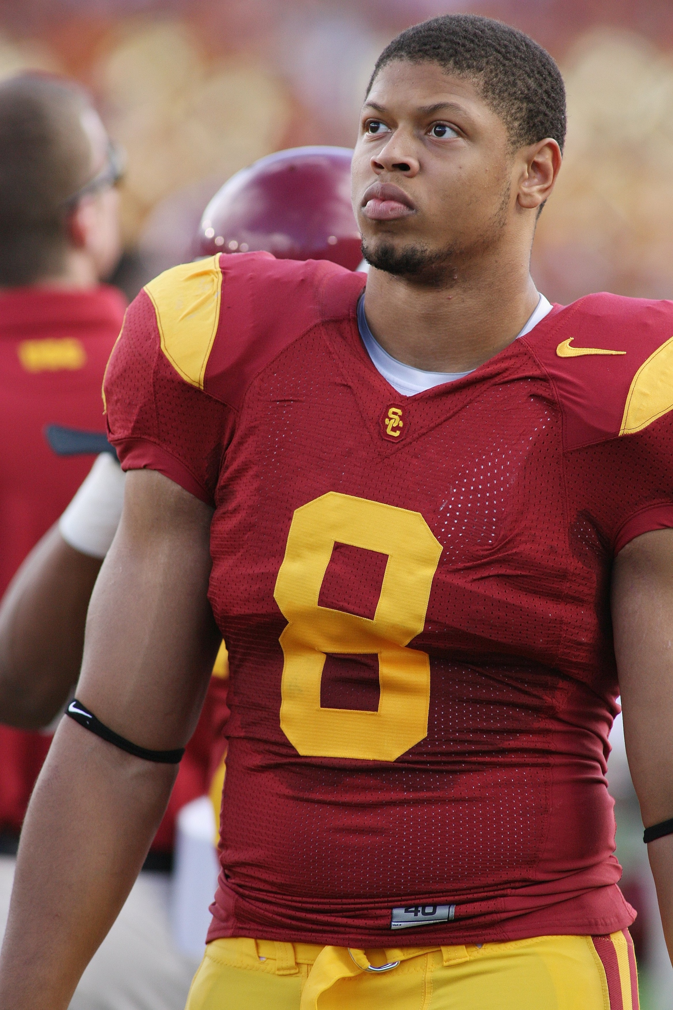PASADENA, CA - DECEMBER 6:  Nick Perry #8 of the USC Trojans walks on the sideline against the UCLA Bruins on December 6, 2008 at the Rose Bowl in Pasadena, California.  USC won 28-7.  (Photo by Jeff Golden/Getty Images)