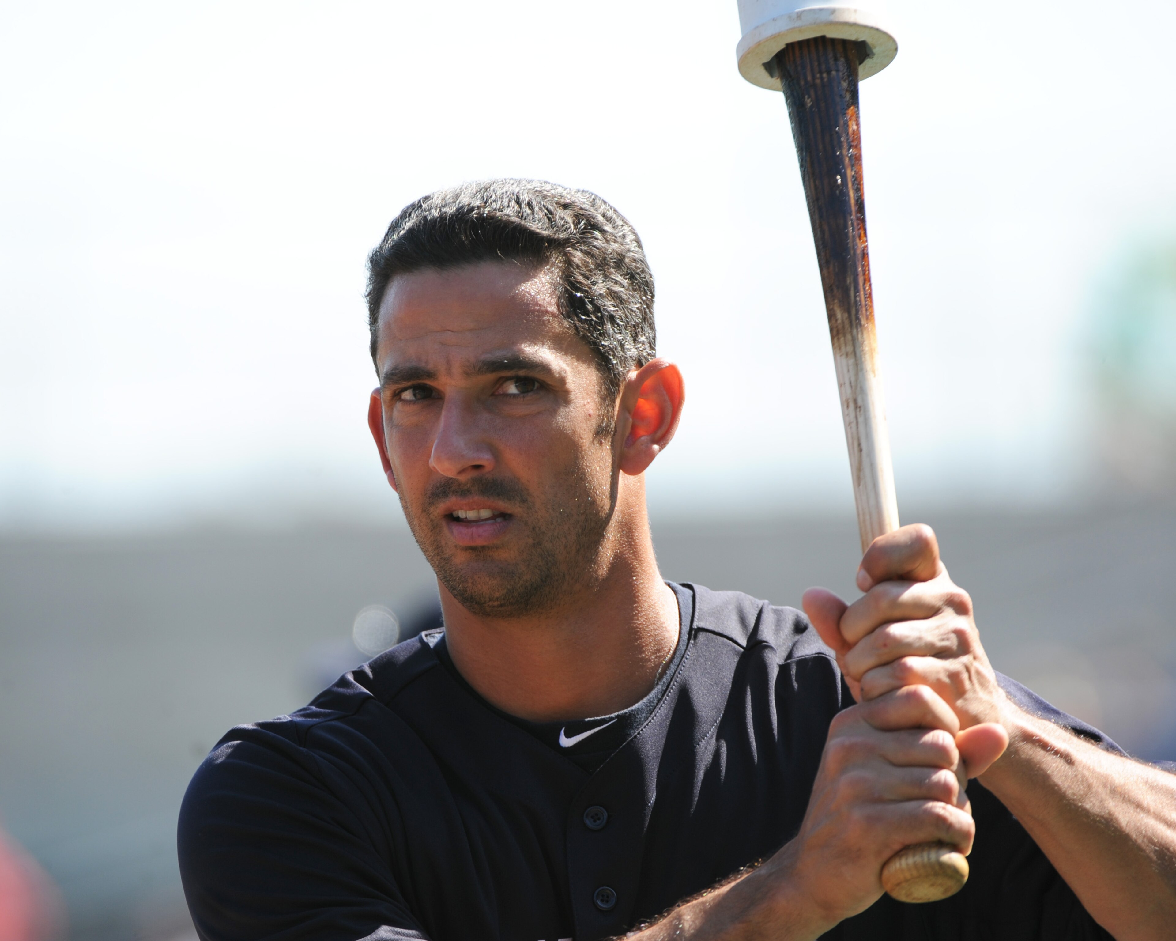 CLEARWATER, FL - FEBRUARY 27:  Designated hitter Jorge Posada #20 of the New York Yankees warms up before play against the Philadelphia Phillies February 27, 2011 at Bright House Field in Clearwater, Florida.  (Photo by Al Messerschmidt/Getty Images)
