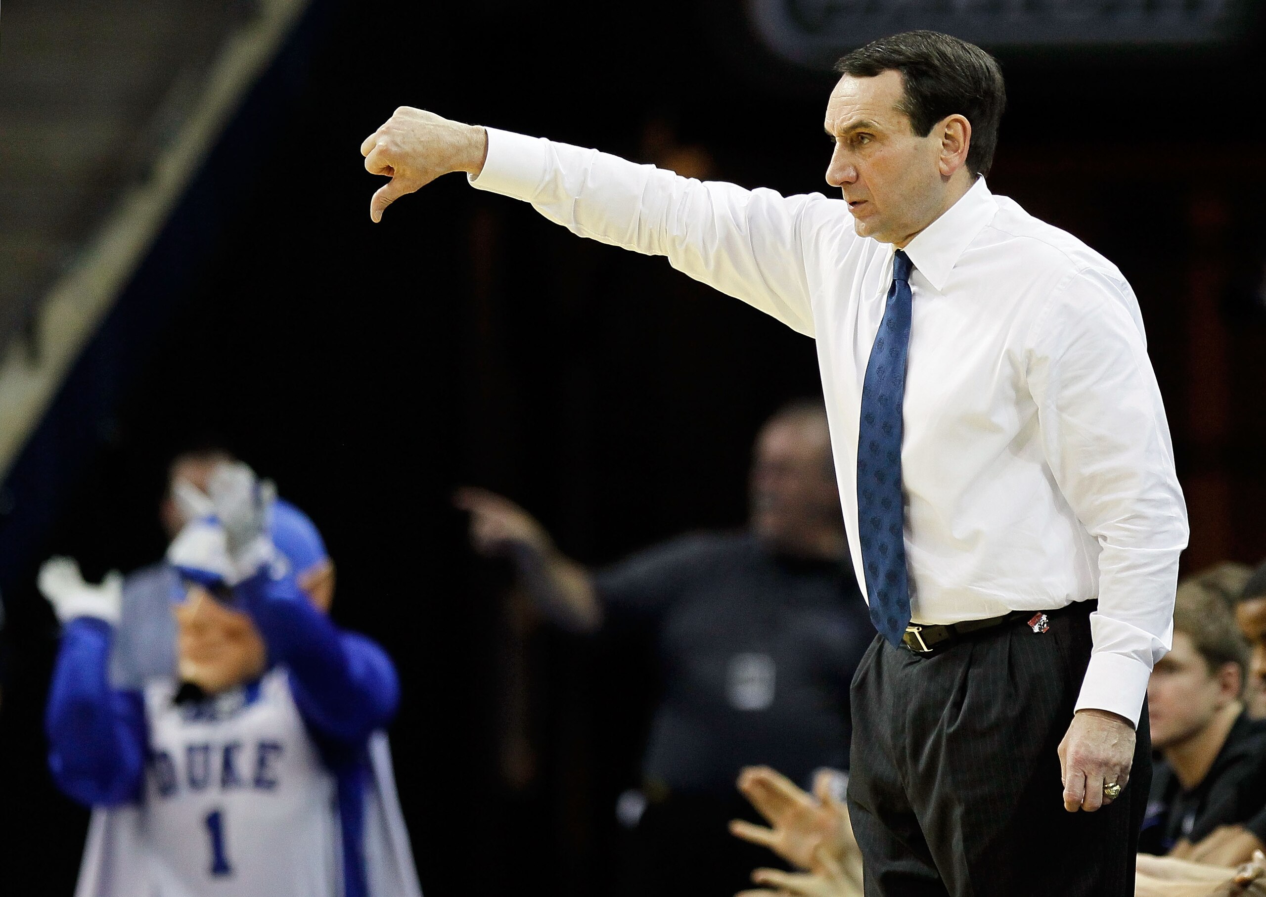 CHARLOTTE, NC - MARCH 20:  Head coach Mike Krzyzewski of the Duke Blue Devils reacts in the second half while taking on the Michigan Wolverines during the third round of the 2011 NCAA men's basketball tournament at Time Warner Cable Arena on March 20, 201