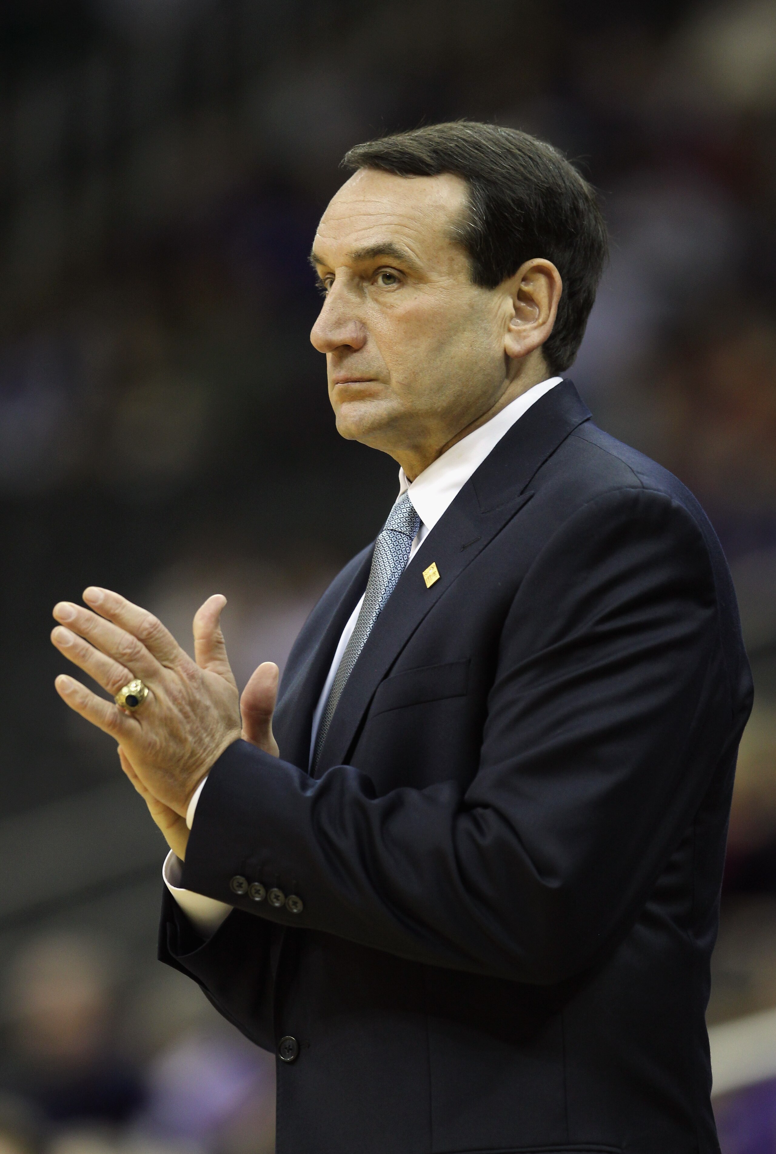 KANSAS CITY, MO - NOVEMBER 22:  Head coach Mike Krzyzewski of the Duke Blue Devils coaches from the bench during the CBE Classic game against the Kansas State Wildcats on November 23, 2010 at the Sprint Center in Kansas City, Missouri.  (Photo by Jamie Sq