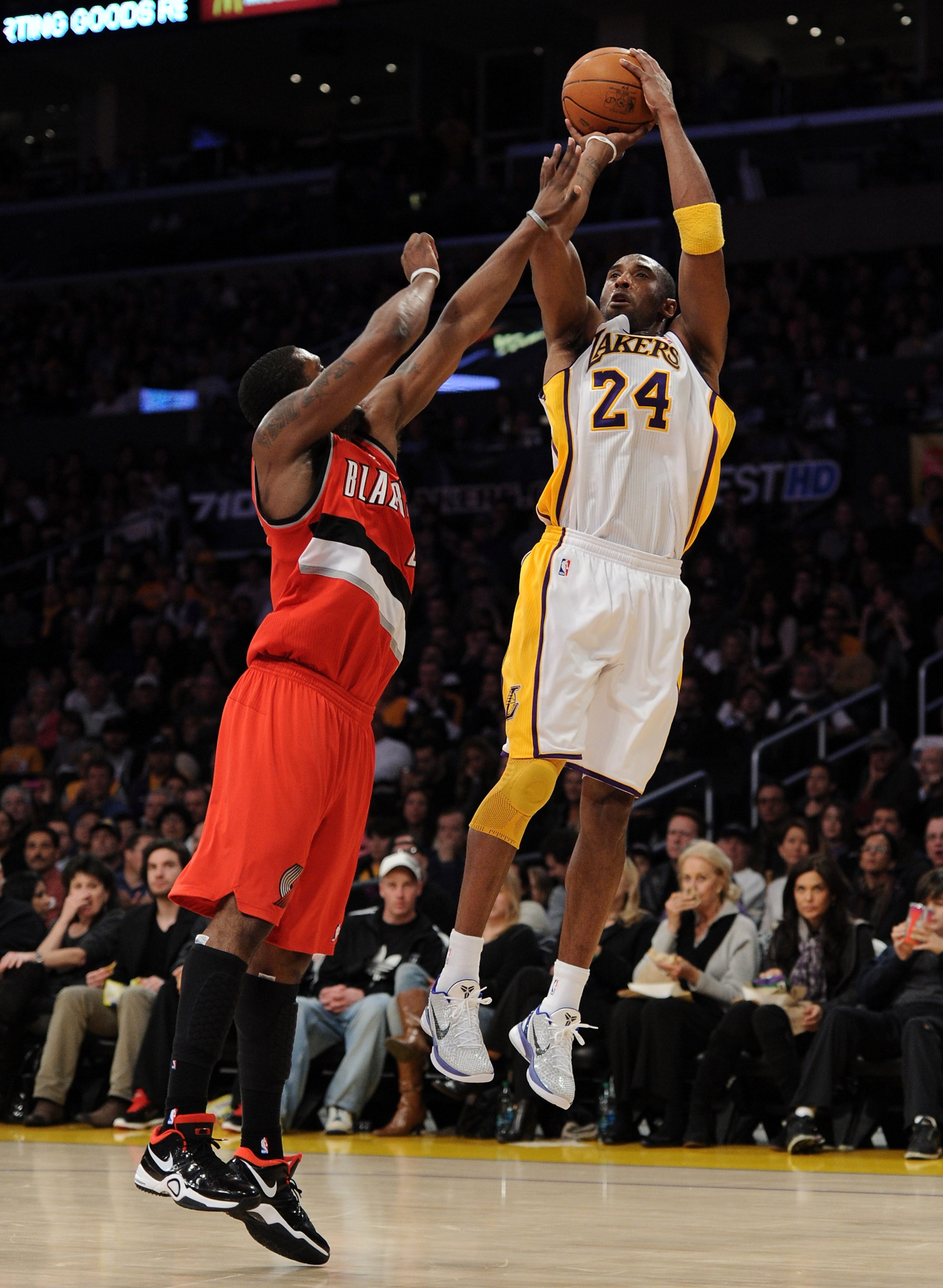 LOS ANGELES, CA - MARCH 20:  Kobe Bryant #24 of the Los Angeles Lakers shoots a jumper over Wesley Matthews #2 of the Portland Trail Blazers at the Staples Center on March 20, 2011 in Los Angeles, California.  NOTE TO USER: User expressly acknowledges and