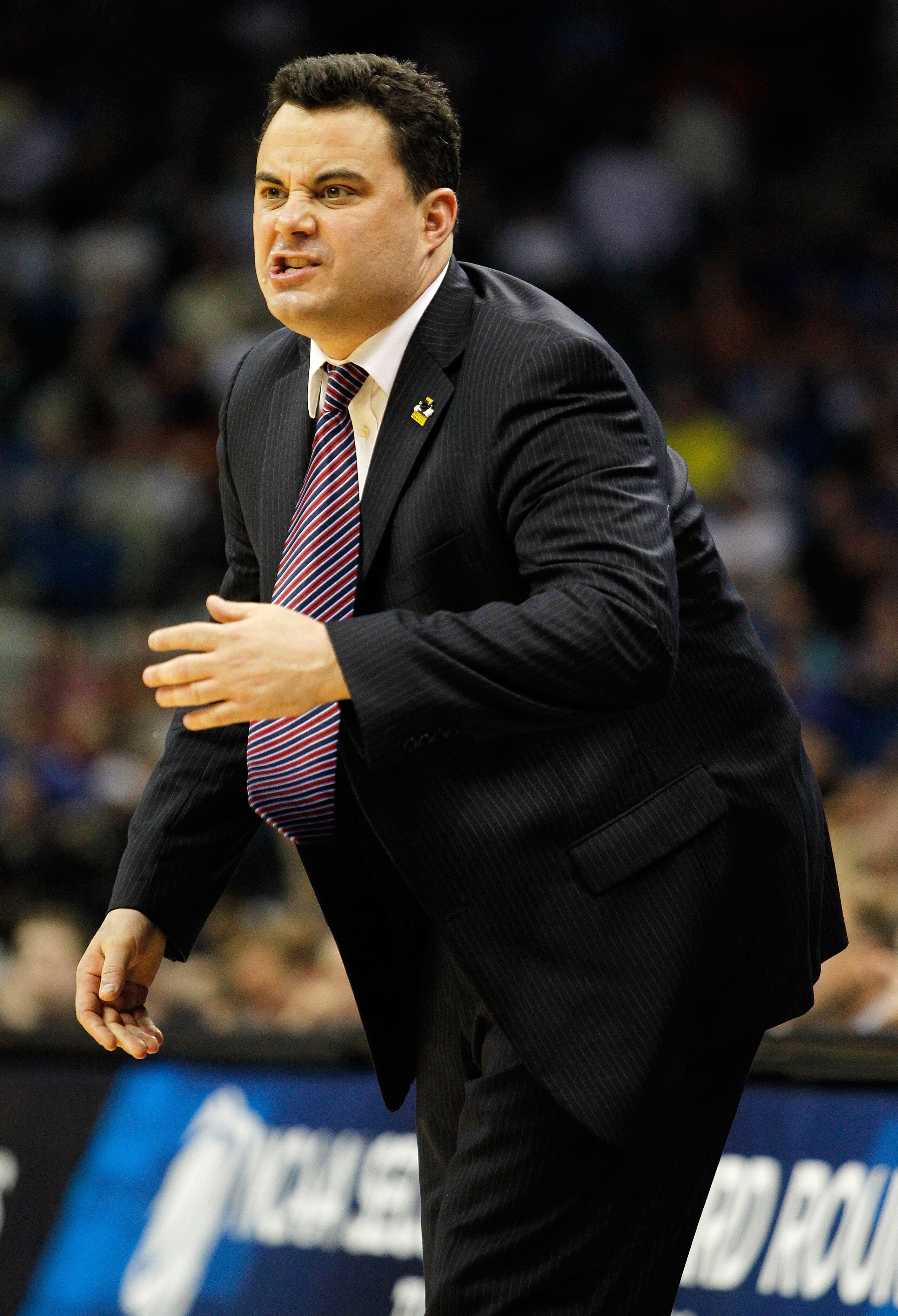 TULSA, OK - MARCH 18:  Head coach Sean Miller of the Arizona Wildcats yells from the sidelines during the second round game against the Memphis Tigers in the 2011 NCAA men's basketball tournament at BOK Center on March 18, 2011 in Tulsa, Oklahoma.  (Photo