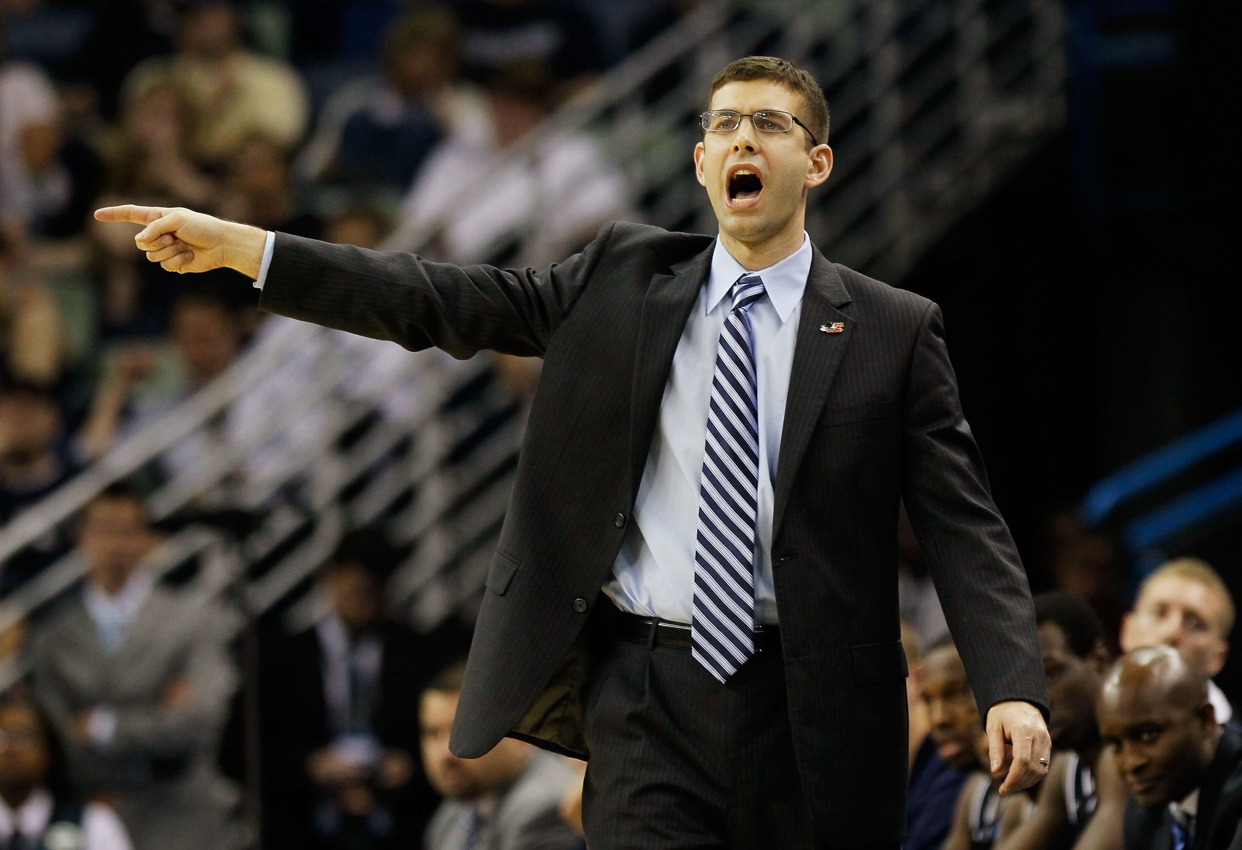 NEW ORLEANS, LA - MARCH 24:  head coach Brad Stevens of the Butler Bulldogs yells to his players during their game against the Wisconsin Badgers in the Southeast regional of the 2011 NCAA men's basketball tournament at New Orleans Arena on March 24, 2011