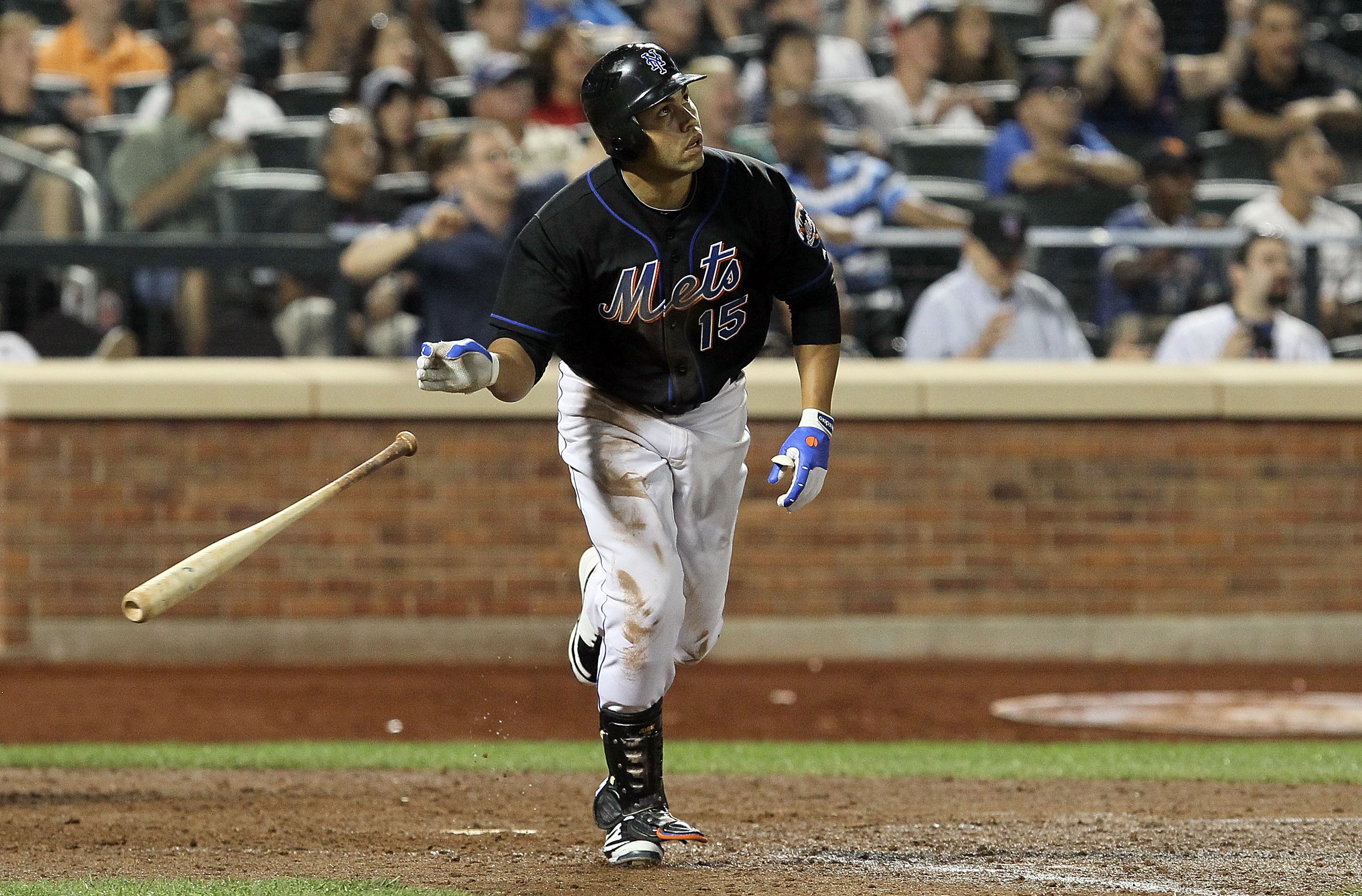 NEW YORK - JULY 31:  Carlos Beltran #15 of the New York Mets hits a game winning walk off sacrifice fly against the Arizona Diamondbacks on July 31, 2010 at Citi Field in the Flushing neighborhood of the Queens borough of New York City. The Mets defeated