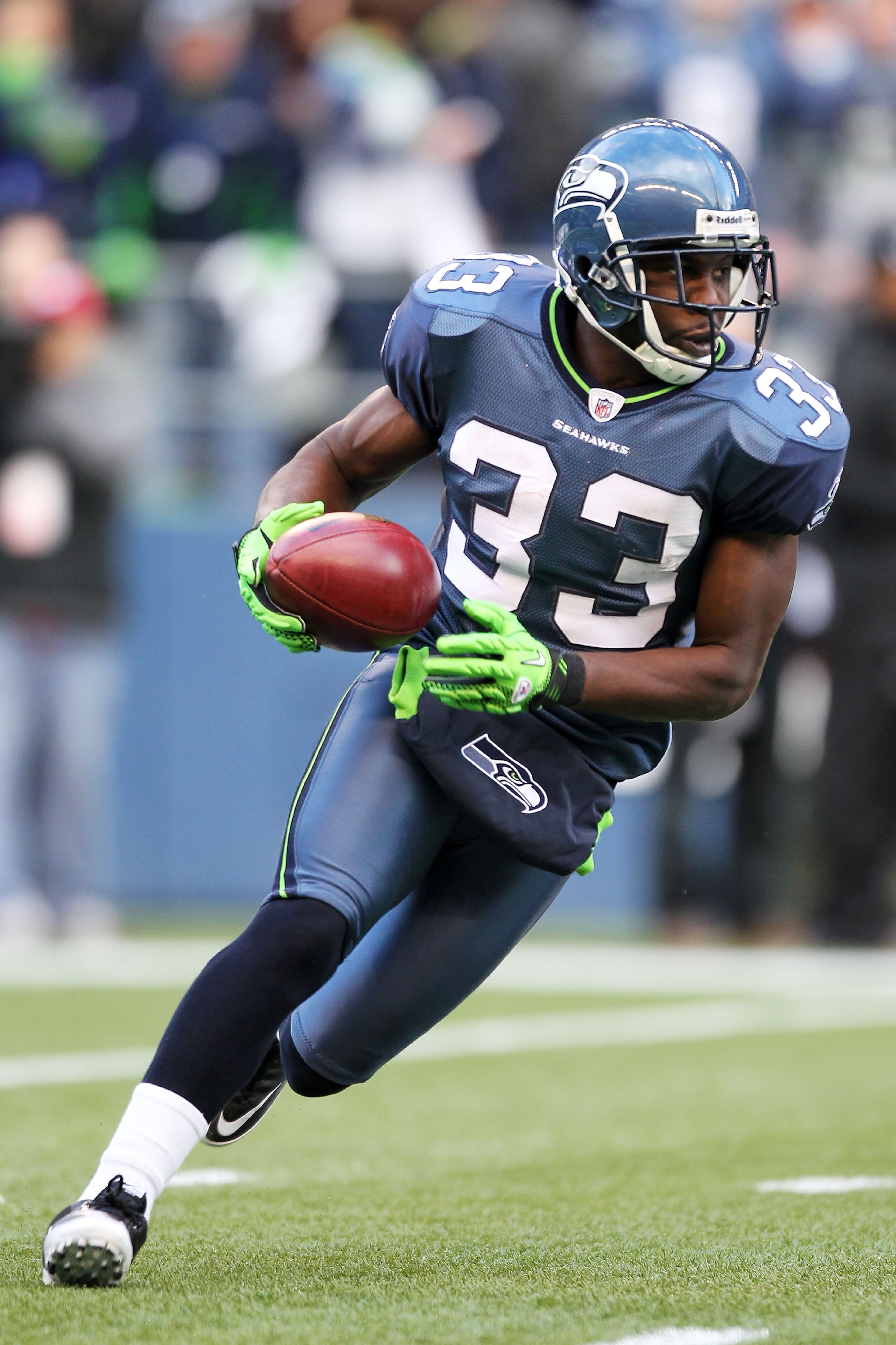 SEATTLE, WA - JANUARY 08: Leon Washington #33 of the Seattle Seahawks runs down field against the New Orleans Saints during the 2011 NFC wild-card playoff game at Qwest Field on January 8, 2011 in Seattle, Washington. (Photo by Otto Greule Jr/Getty Imag SEATTLE, WA - JANUARY 08: Leon Washington #33 of the Seattle Seahawks runs down field against the New Orleans Saints during the 2011 NFC wild-card playoff game at Qwest Field on January 8, 2011 in Seattle, Washington. (Photo by Otto Greule Jr/Getty Imag