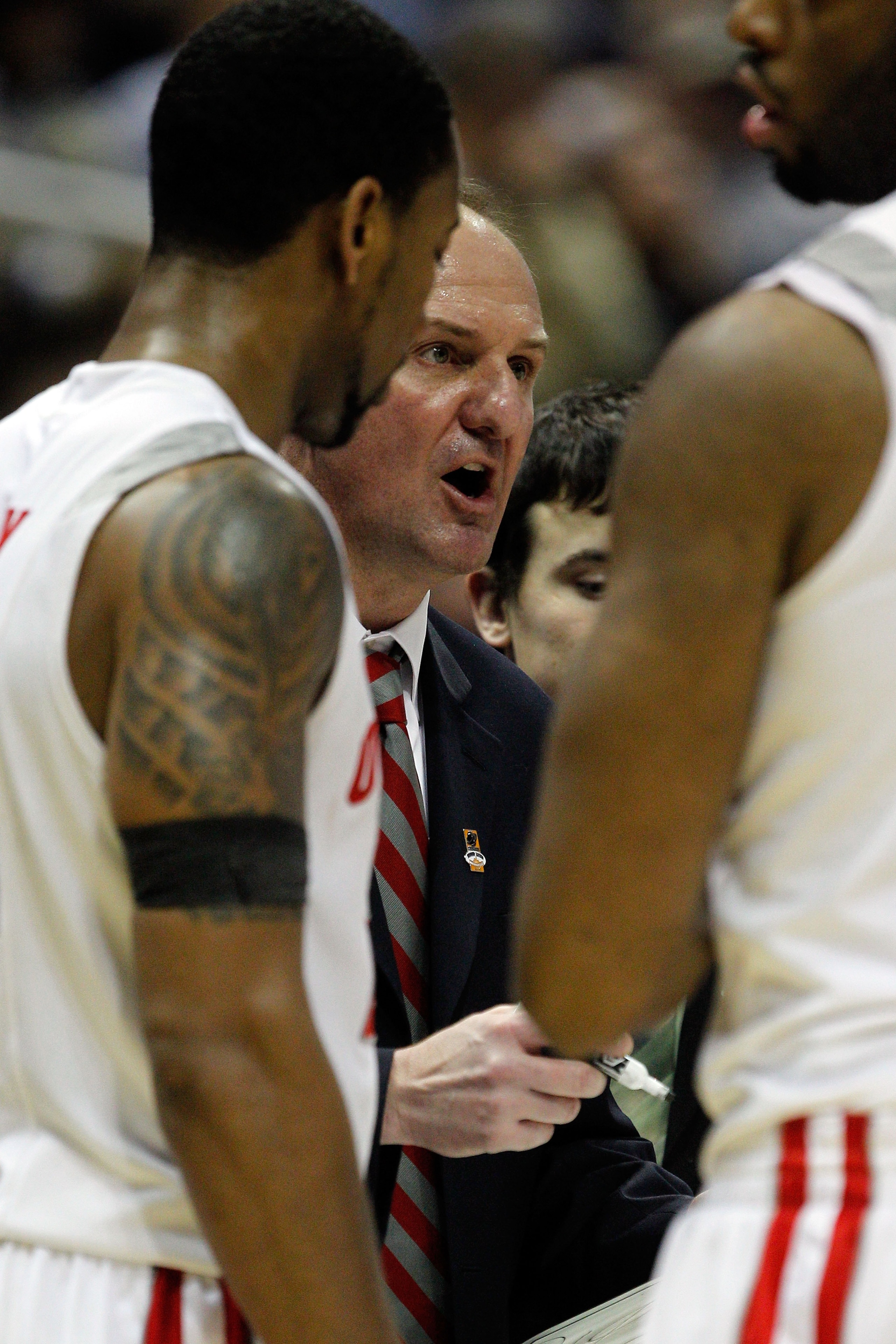 MILWAUKEE - MARCH 21:  Head coach Thad Matta of the Ohio State Buckeyes talks with his players against the Georgia Tech Yellow Jackets during the second round of the 2010 NCAA men's basketball tournament at the Bradley Center on March 21, 2010 in Milwauke