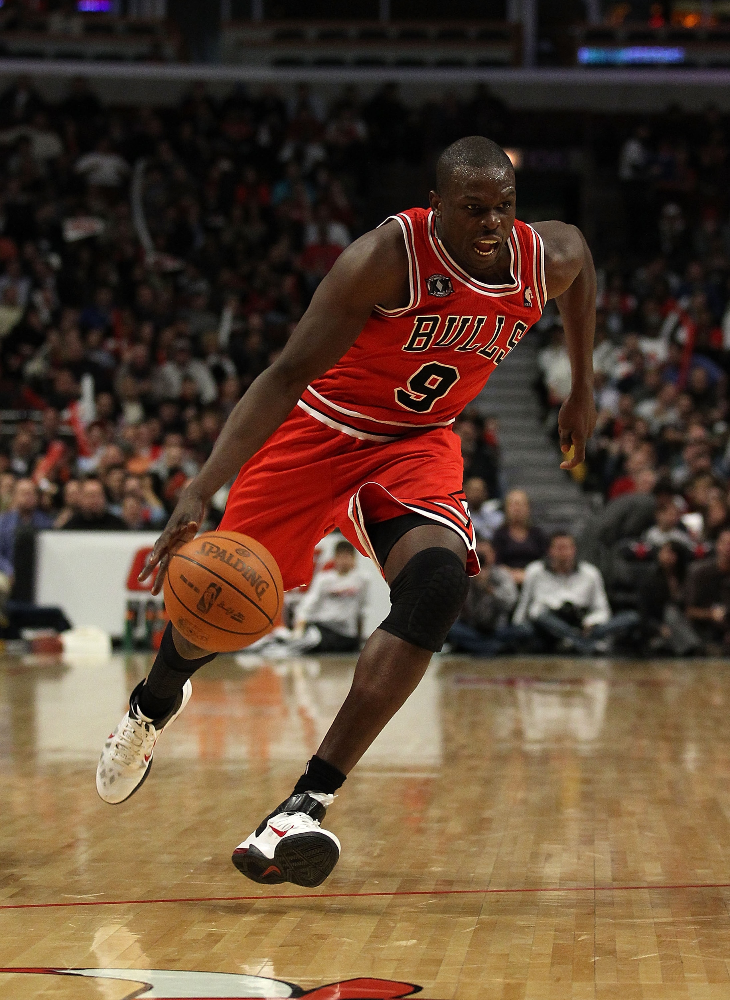 CHICAGO, IL - FEBRUARY 15: Loul Deng #9 of the Chicago Bulls drives up the court against the Charlotte Bobcats at the United Center on February 15, 2011 in Chicago, Illinois. The Bulls defeated the Bobcats 106-94. NOTE TO USER: User expressly acknowledges