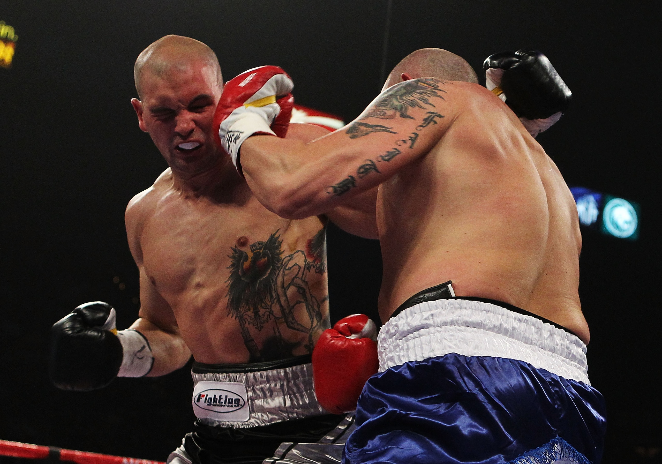 LAS VEGAS - MARCH 12:  Tommy Zbikowski and Richard Bryant exchange punches during the Cruiserweight bout at the MGM Grand Garden Arena on March 12, 2011 in Las Vegas, Nevada.  (Photo by Al Bello/Getty Images)
