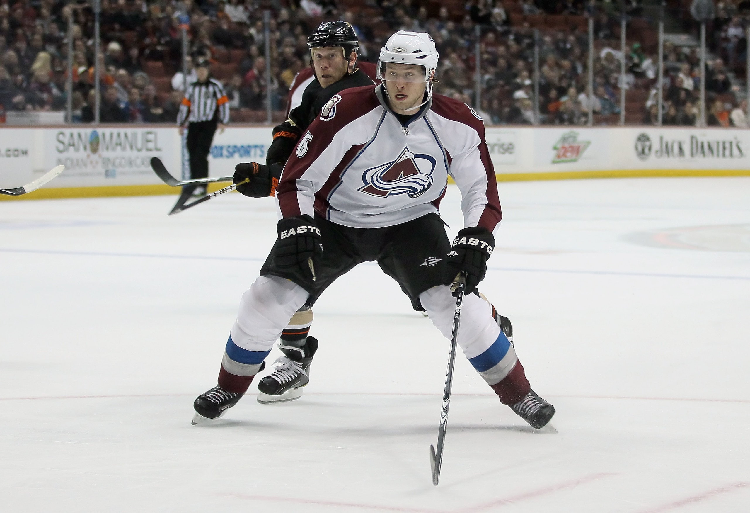 ANAHEIM, CA - FEBRUARY 27:  Erik Johnson #6 of the Colorado Avalanche is pursued by Todd Marchant #22 of the Anaheim Ducks at Honda Center on February 27, 2011 in Anaheim, California.  (Photo by Jeff Gross/Getty Images)