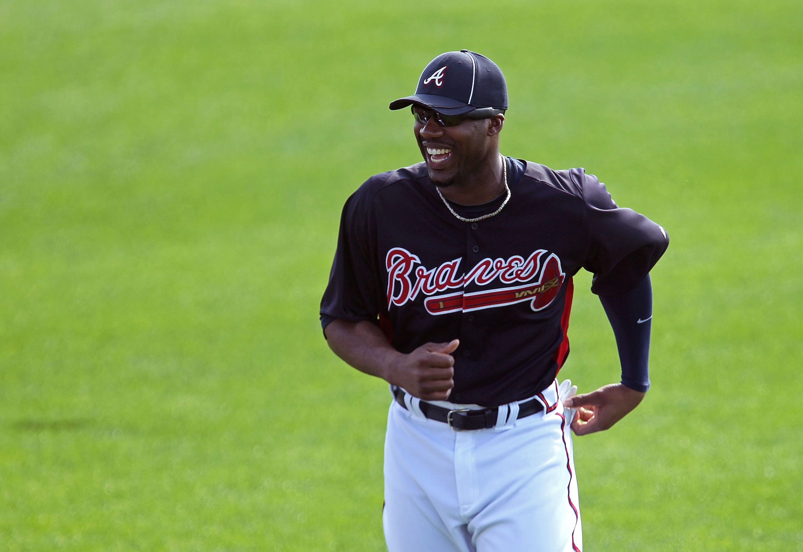 LAKE BUENA VISTA, FL - FEBRUARY 21:  Jason Heyward #22 of the Atlanta Braves jogs across the mound during a spring training workout at Champion Stadium on February 21, 2011 in Lake Buena Vista, Florida.  (Photo by Mike Ehrmann/Getty Images)