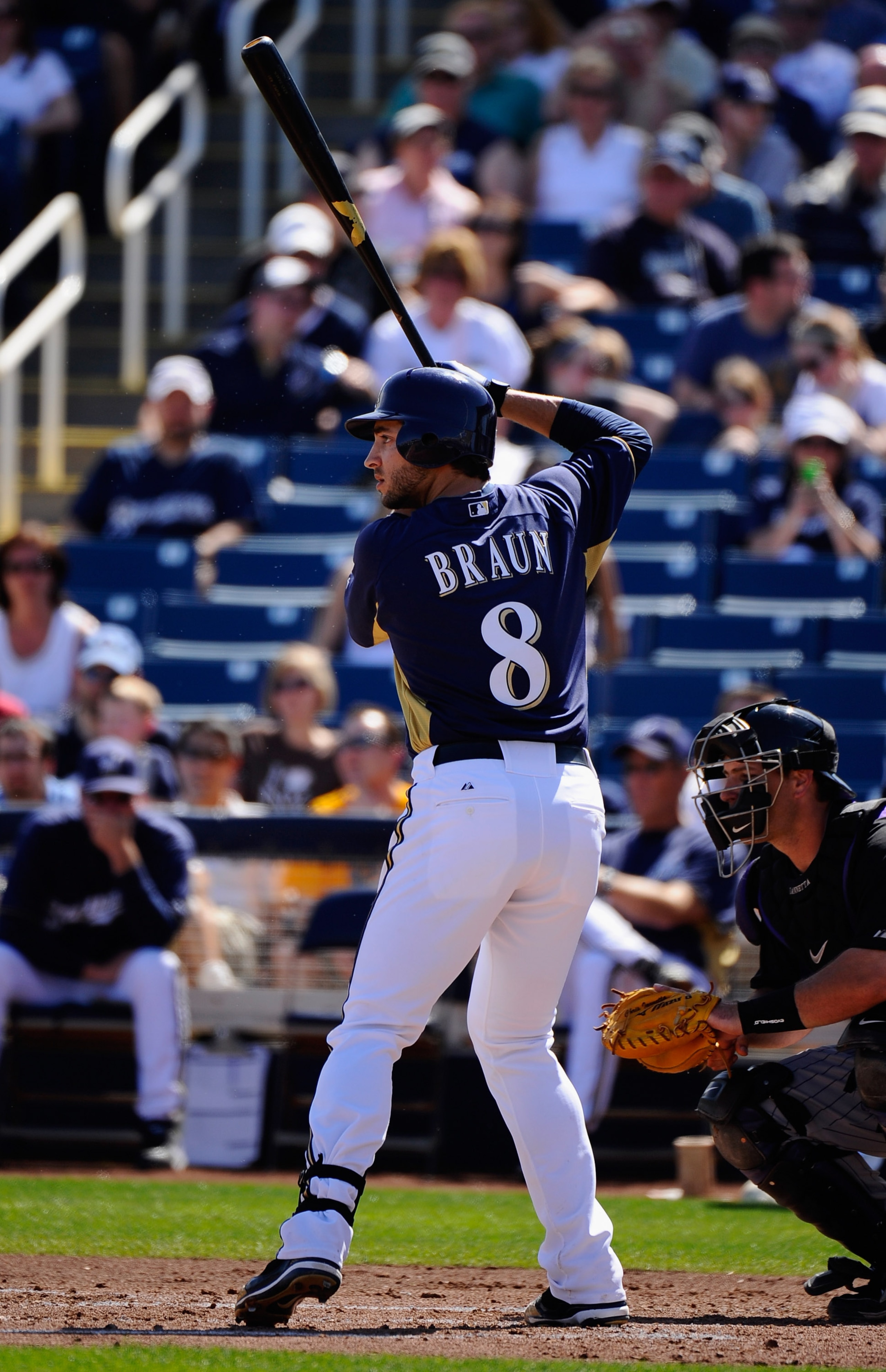 PHOENIX, AZ - MARCH 10:  Ryan Braun #8 of the Milwaukee Brewers swings the bat against the Colorado Rockies during the spring training baseball game at Maryvale Baseball Park on March 10, 2011 in Phoenix, Arizona.  (Photo by Kevork Djansezian/Getty Images