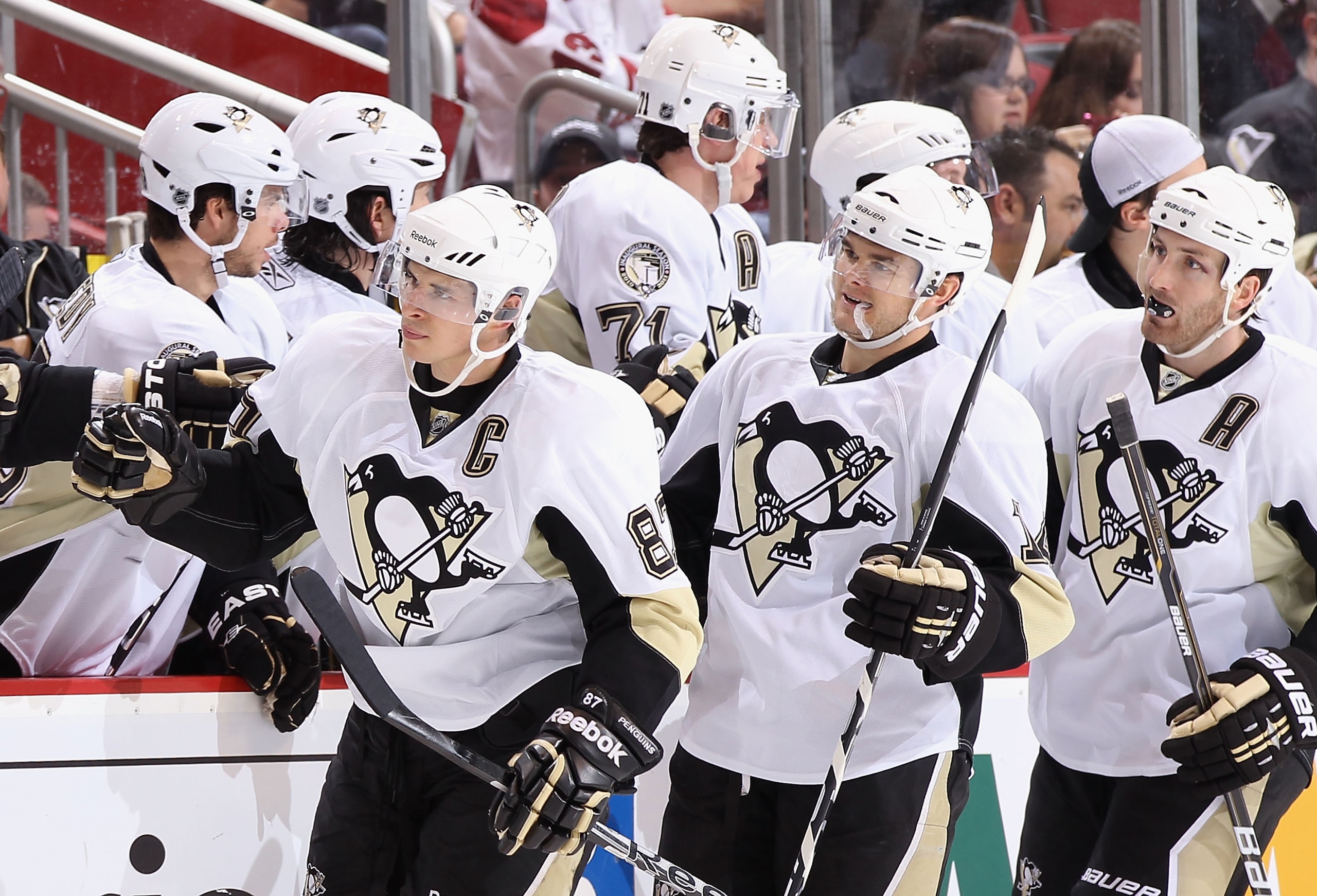 GLENDALE, AZ - NOVEMBER 06:  Sidney Crosby #87 of the Pittsburgh Penguins celebrates with teammates after scoring against the Phoenix Coyotes during the NHL game at Jobing.com Arena on November 6, 2010 in Glendale, Arizona.  The Penguins defeated the Coyo