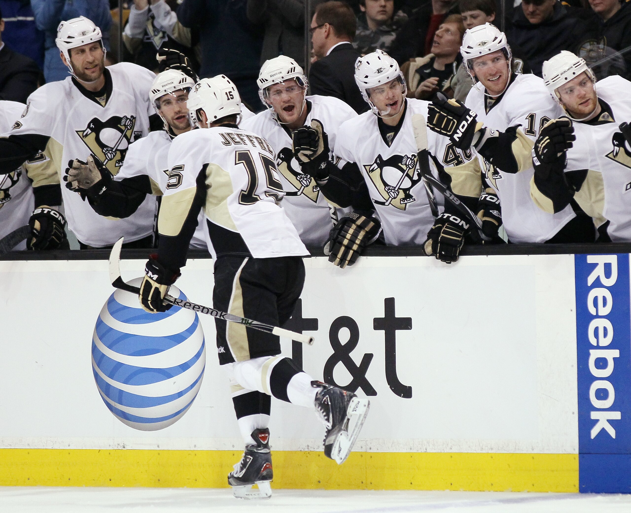 BOSTON, MA - MARCH 05:  Dustin Jeffrey #15 of the Pittsburgh Penguins is congratulated by teammates on the bench after he scored in the second period against the Boston Bruins on March 5, 2011 at the TD Garden in Boston, Massachusetts.  (Photo by Elsa/Get