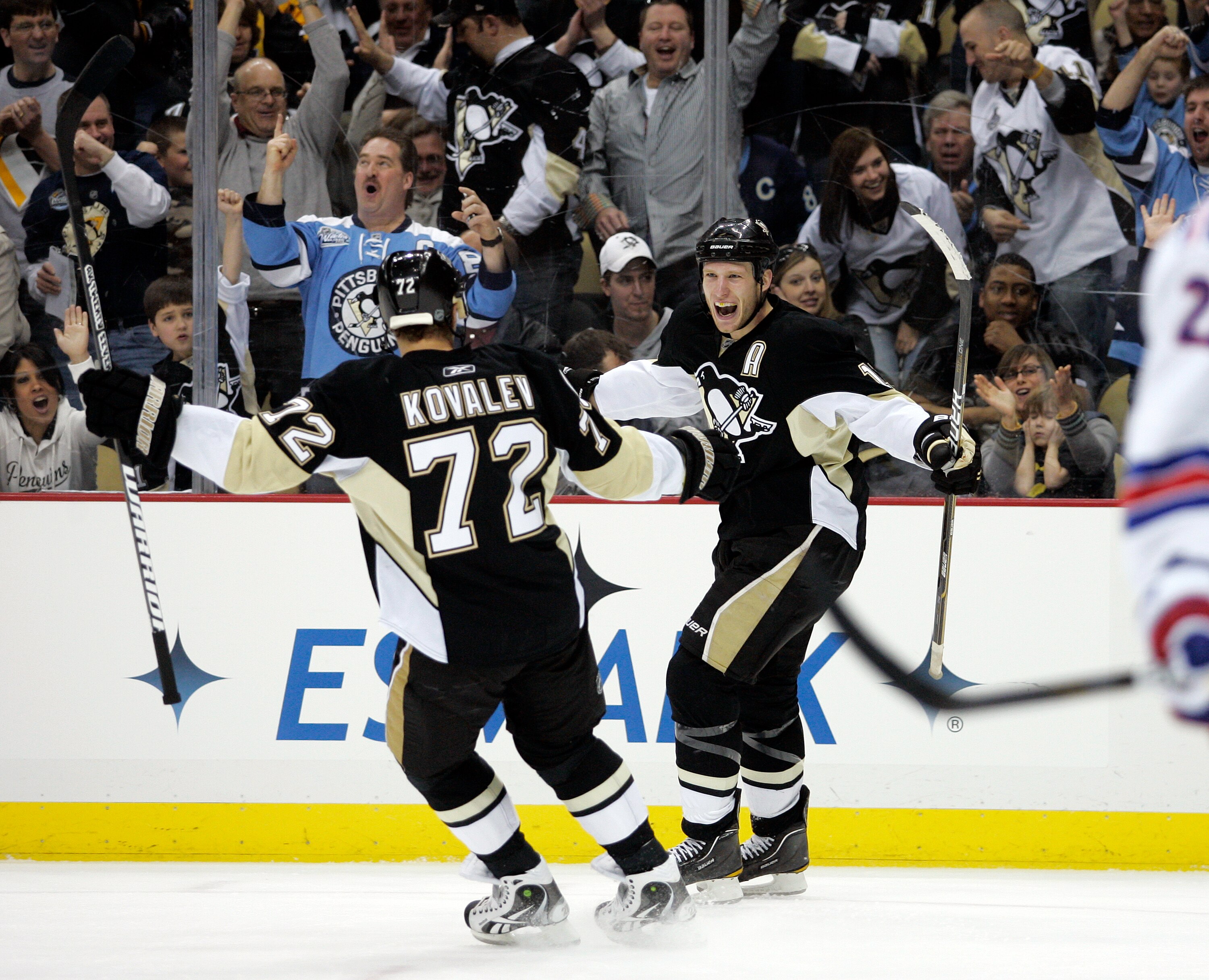 PITTSBURGH, PA - MARCH 20:  Jordan Staal #11 of the Pittsburgh Penguins celebrates his first period goal with Alexei Kovalev #72 against the New York Rangers at Consol Energy Center on March 20, 2011 in Pittsburgh, Pennsylvania.  (Photo by Justin K. Aller