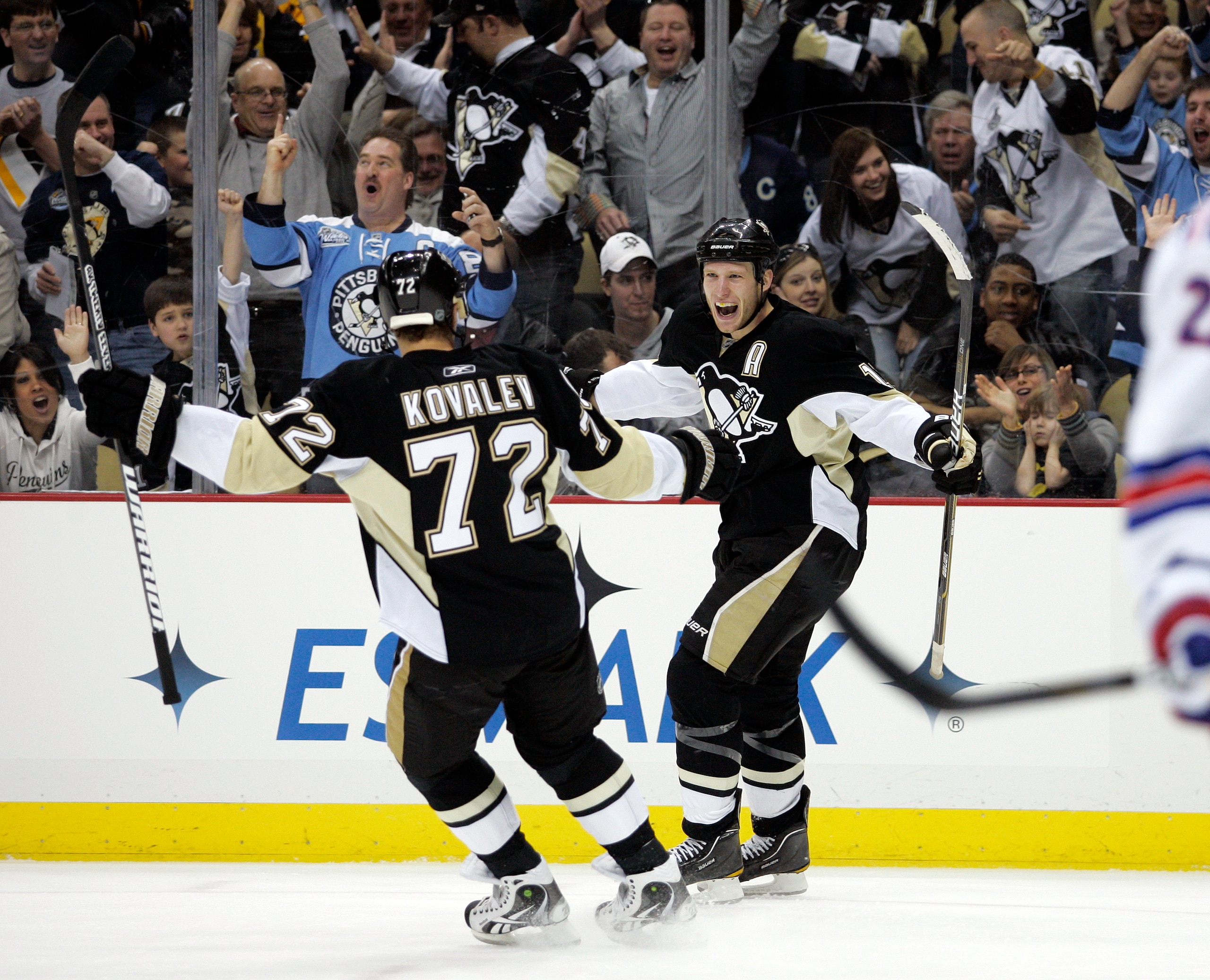 PITTSBURGH, PA - MARCH 20:  Jordan Staal #11 of the Pittsburgh Penguins celebrates his first period goal with Alexei Kovalev #72 against the New York Rangers at Consol Energy Center on March 20, 2011 in Pittsburgh, Pennsylvania.  (Photo by Justin K. Aller