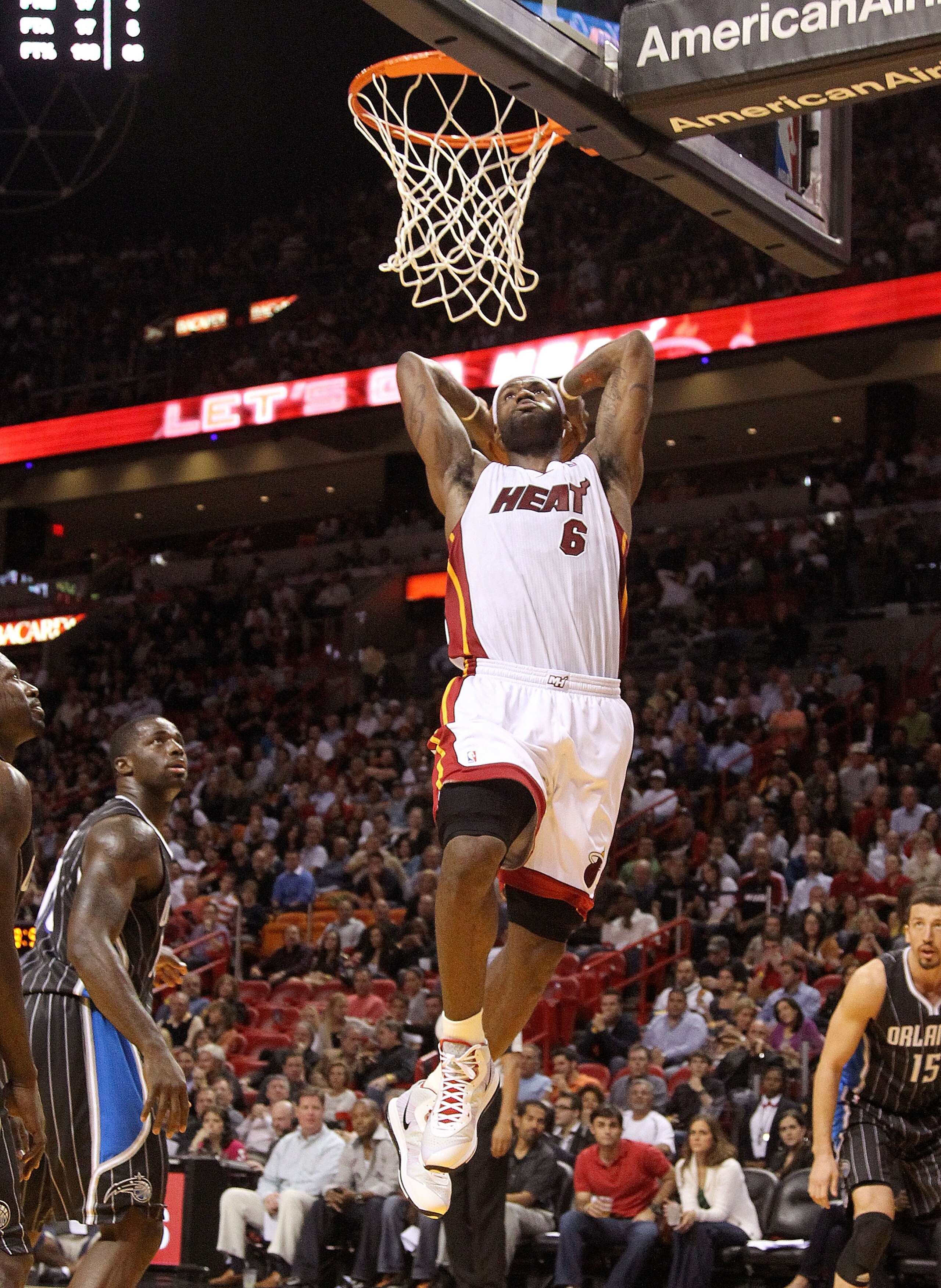 MIAMI, FL - MARCH 03:  LeBron James #6 of the Miami Heat dunks the ball during a game against the Orlando Magic at American Airlines Arena on March 3, 2011 in Miami, Florida. NOTE TO USER: User expressly acknowledges and agrees that, by downloading and/or