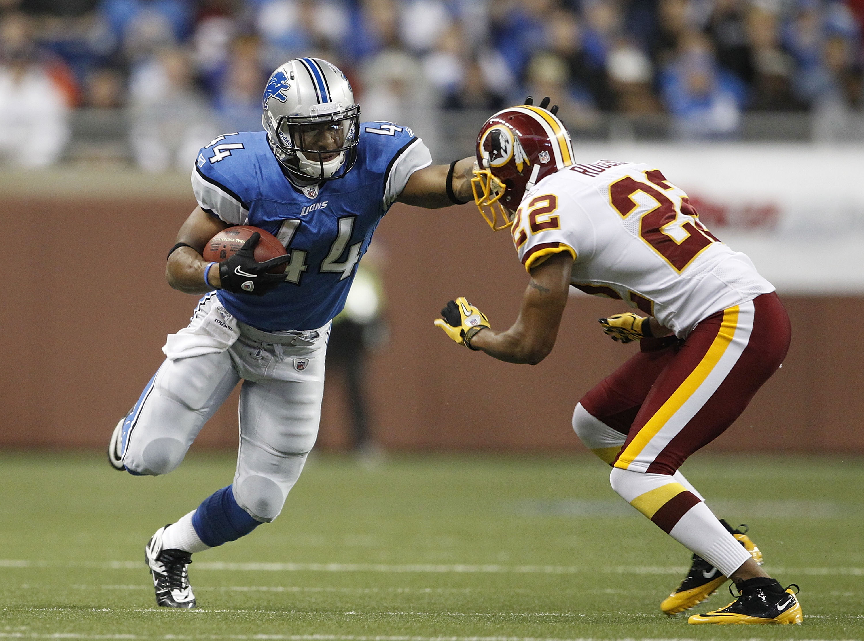 DETROIT - OCTOBER 31: Jahvid Best #44 of the Detroit Lions runs for a first down as Carlos Rogers #22 of the Washington Redskins gets ready to make the stop during the first quarter of the game at Ford Field on October 31, 2010 in Detroit, Michigan. (Phot DETROIT - OCTOBER 31: Jahvid Best #44 of the Detroit Lions runs for a first down as Carlos Rogers #22 of the Washington Redskins gets ready to make the stop during the first quarter of the game at Ford Field on October 31, 2010 in Detroit, Michigan. (Phot
