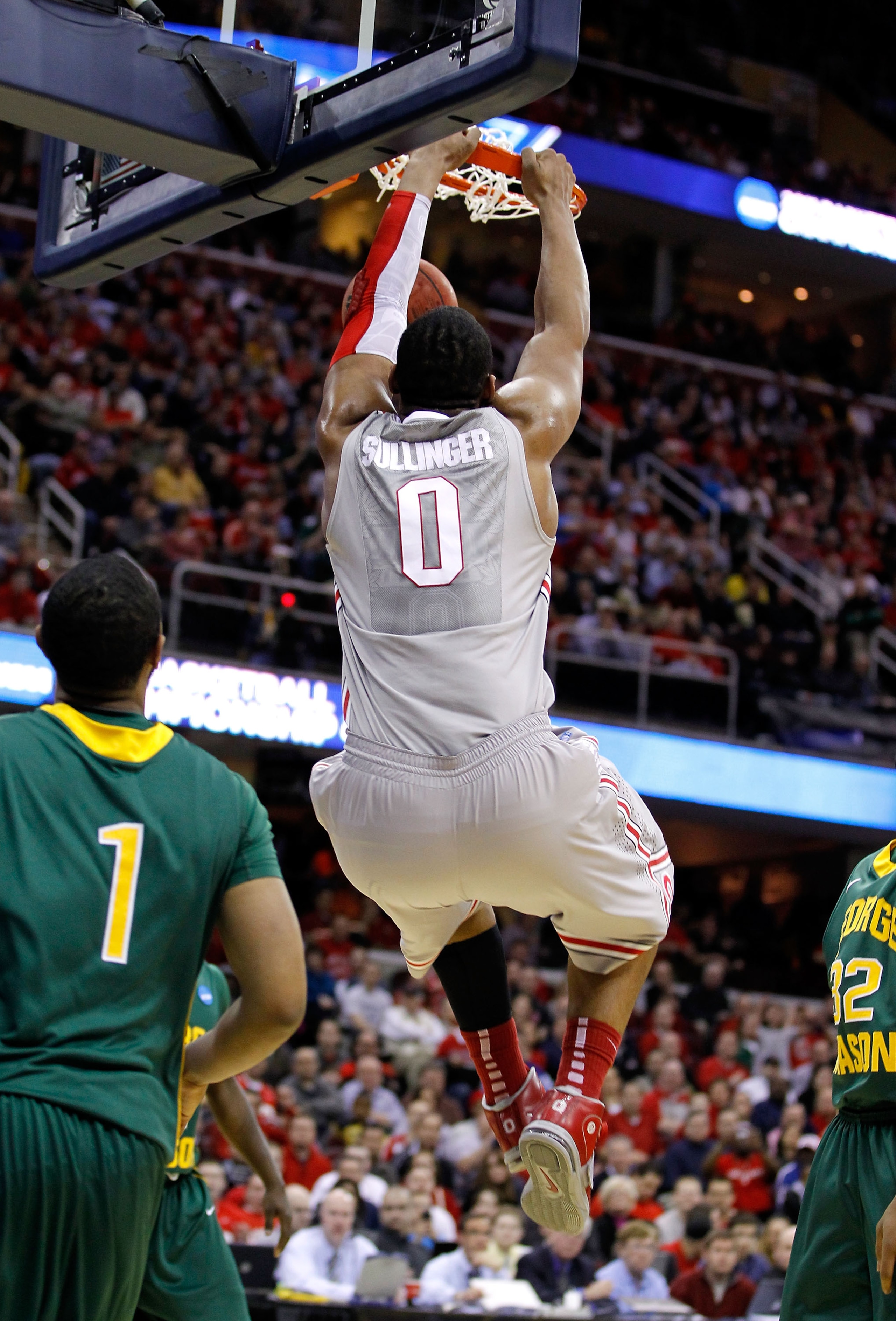 CLEVELAND, OH - MARCH 20: Jared Sullinger #0 of the Ohio State Buckeyes dunks the ball against the George Mason Patriots during the third of the 2011 NCAA men's basketball tournament at Quicken Loans Arena on March 20, 2011 in Cleveland, Ohio.  (Photo by