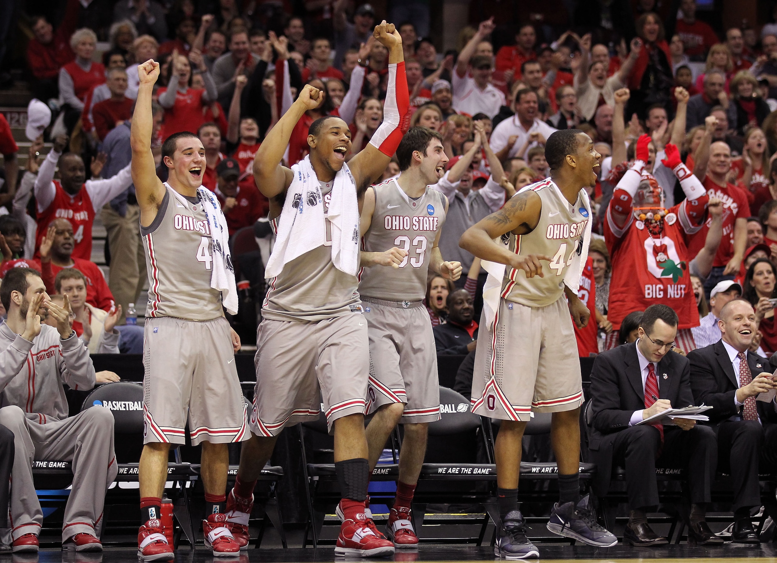 CLEVELAND, OH - MARCH 20:  Aaron Craft #4, Jared Sullinger #0, Jon Diebler #33 and William Buford #44 of the Ohio State Buckeyes look on from the bench late in the second half against the George Mason Patriots during the third of the 2011 NCAA men's baske