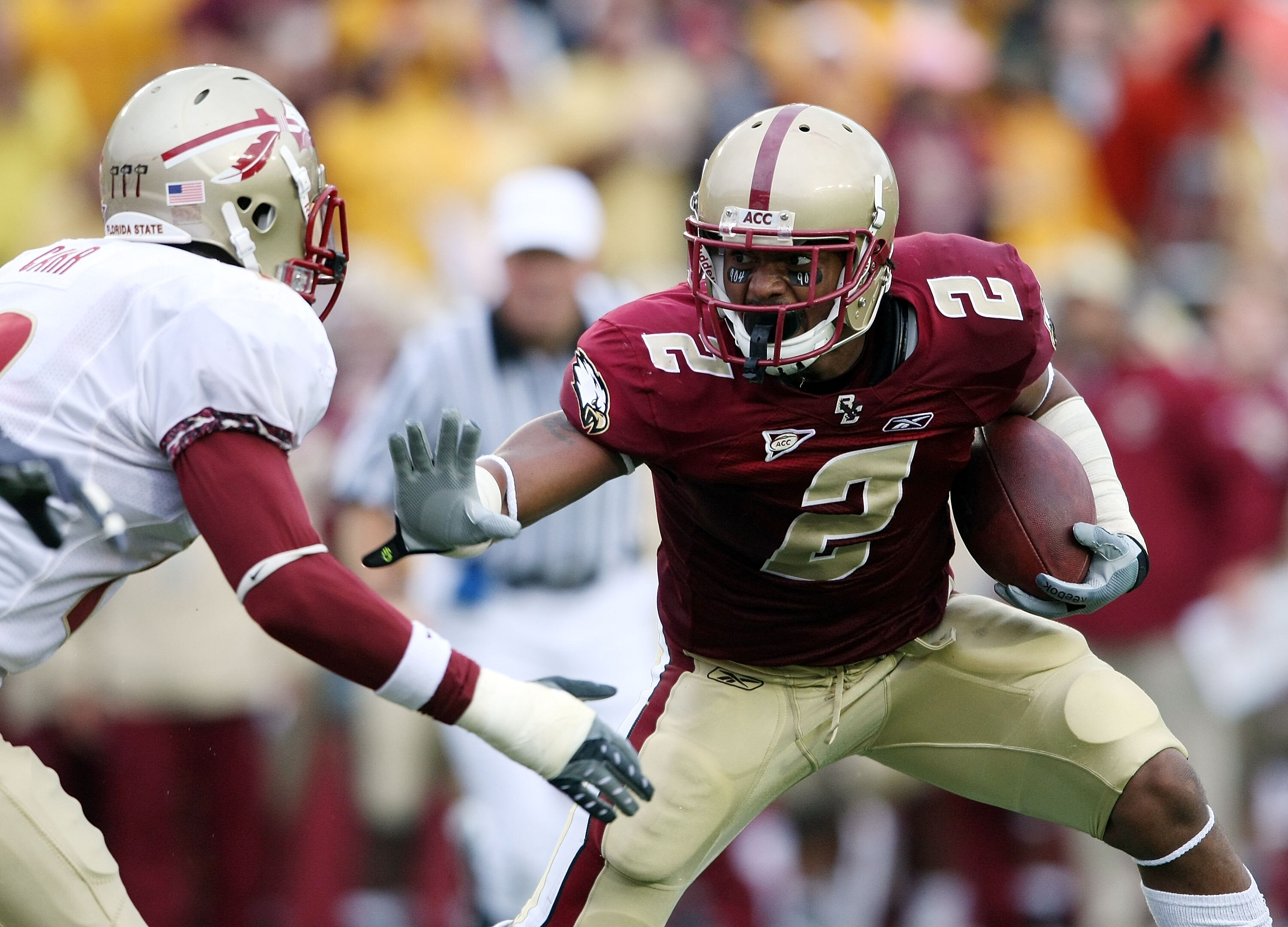 CHESTNUT HILL, MA - OCTOBER 03:  Montel Harris #2  of the Boston College Eagles carries the ball as Nigel Carr #12 of the Florida State Seminoles tries to make the tackle on October 3, 2009 at Alumni Stadium in Chestnut Hill, Massachusetts. (Photo by Elsa