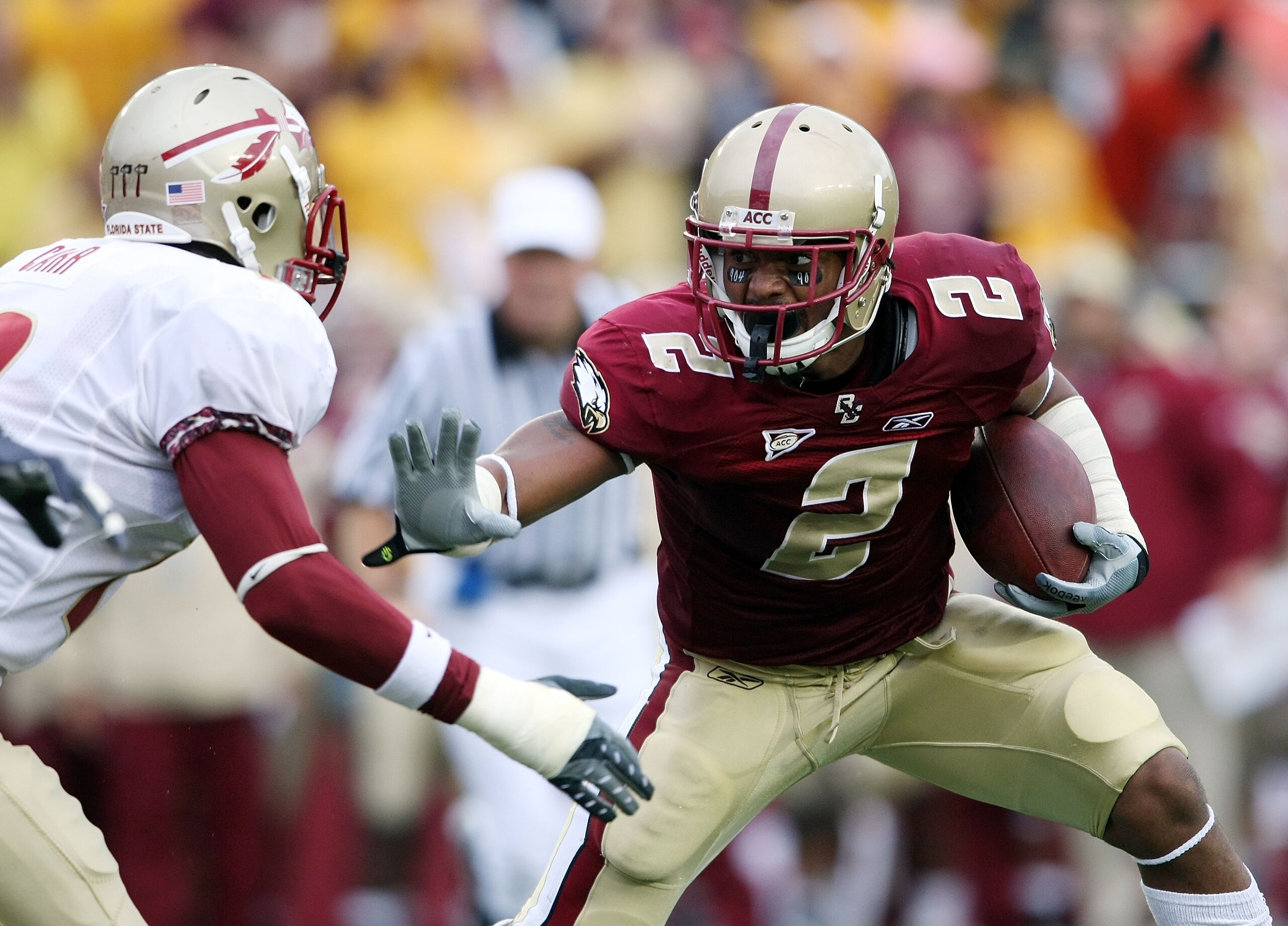 CHESTNUT HILL, MA - OCTOBER 03:  Montel Harris #2  of the Boston College Eagles carries the ball as Nigel Carr #12 of the Florida State Seminoles tries to make the tackle on October 3, 2009 at Alumni Stadium in Chestnut Hill, Massachusetts. (Photo by Elsa