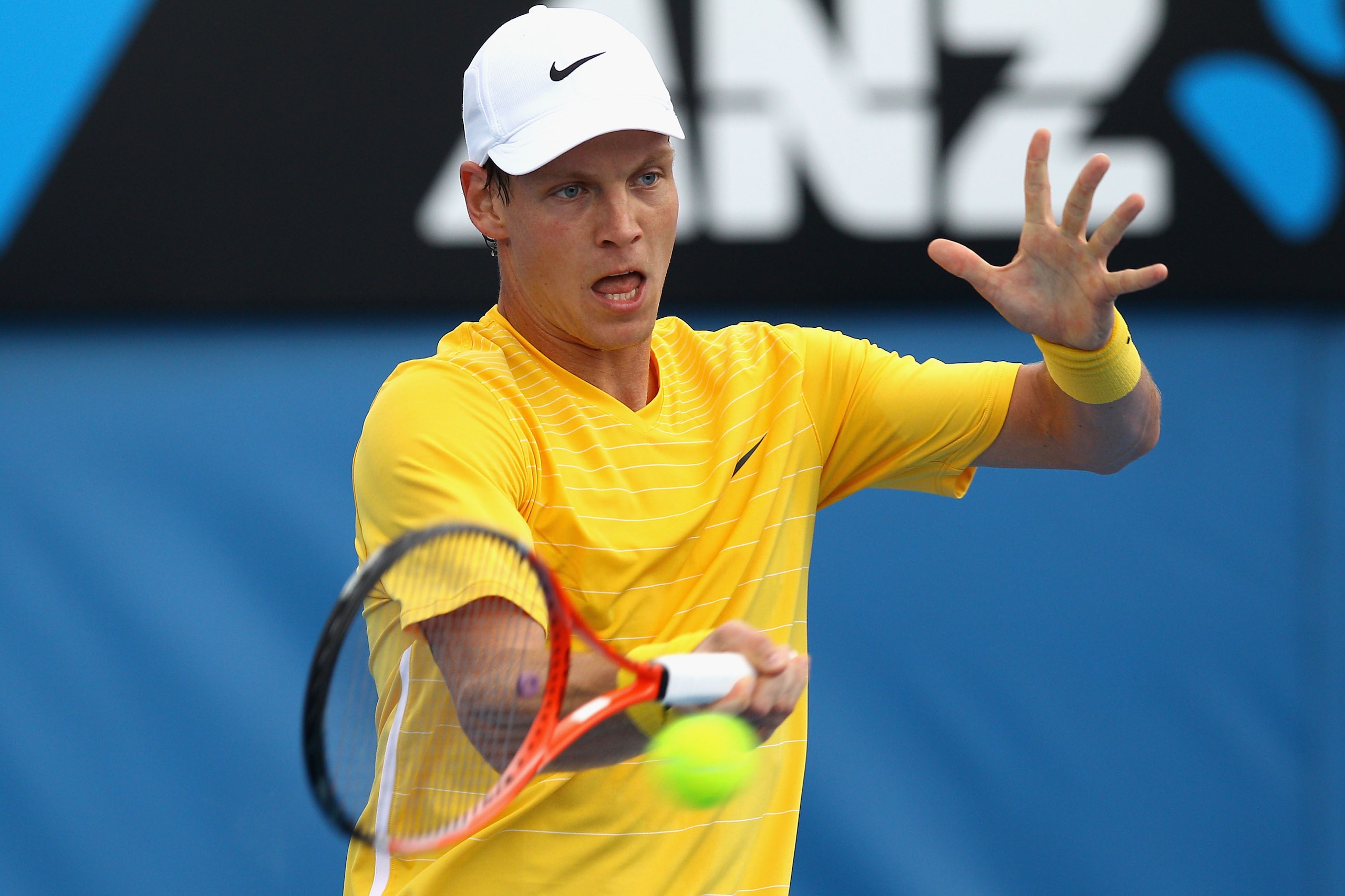 MELBOURNE, AUSTRALIA - JANUARY 17:  Tomas Berdych of the Czech Republic plays a forehand in his first round match against Marco Crugnola of Italy during day one of the 2011 Australian Open at Melbourne Park on January 17, 2011 in Melbourne, Australia.  (P