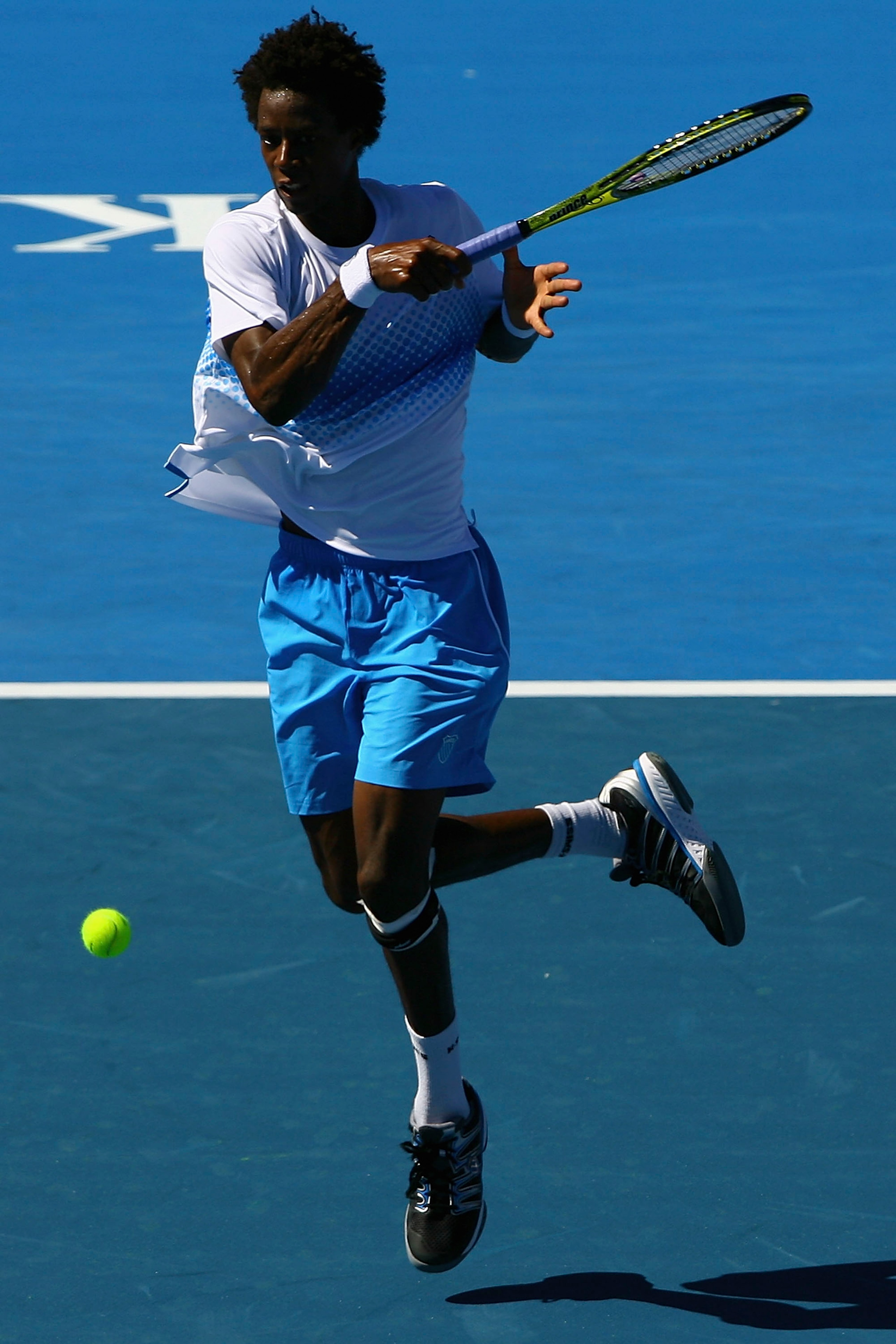 MELBOURNE, AUSTRALIA - JANUARY 15:  Gael Monfils of France plays a forehand during his match against Lleyton Hewitt of Australia during day four of the AAMI Classic at Kooyong on January 15, 2011 in Melbourne, Australia.  (Photo by Robert Prezioso/Getty I