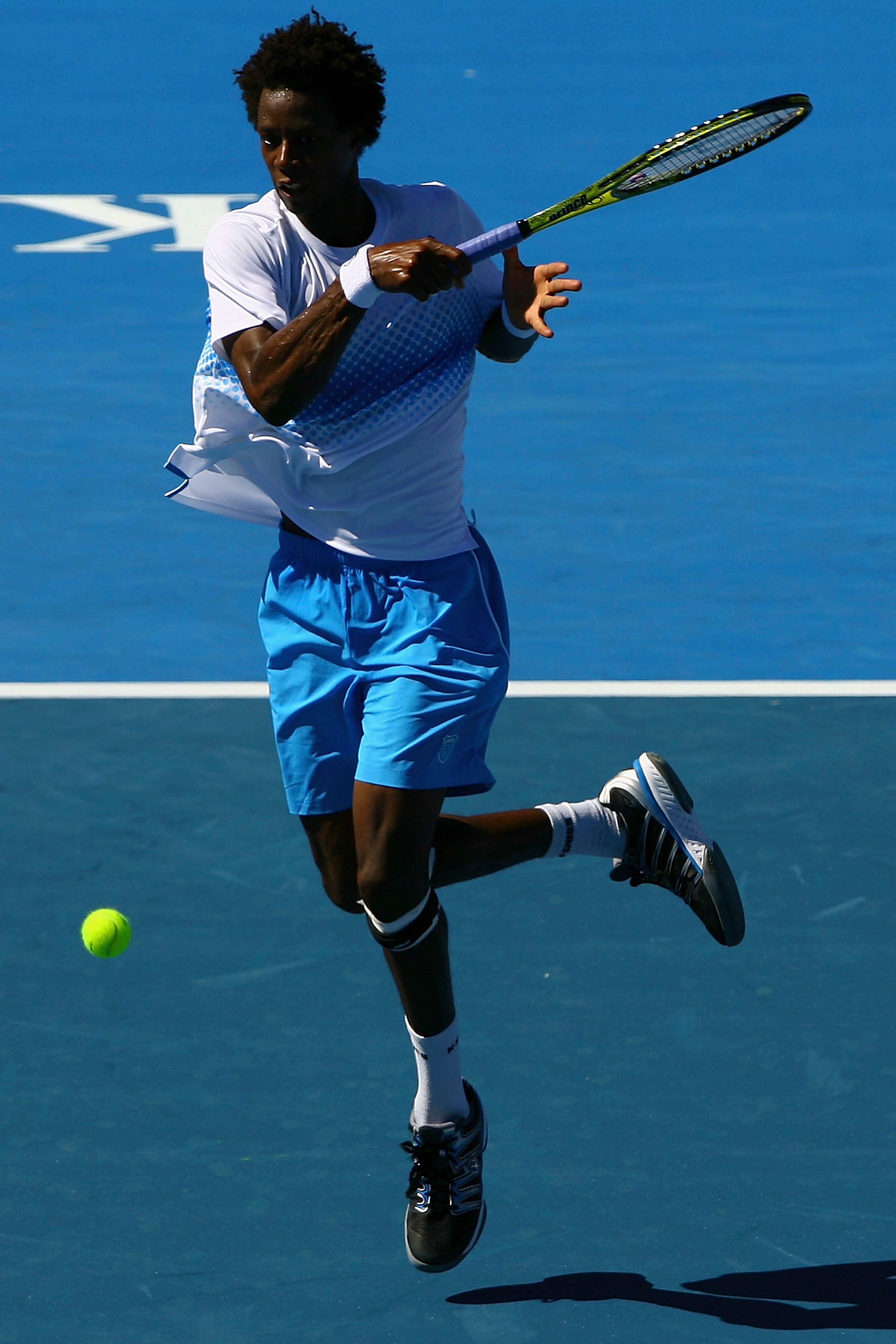 MELBOURNE, AUSTRALIA - JANUARY 15:  Gael Monfils of France plays a forehand during his match against Lleyton Hewitt of Australia during day four of the AAMI Classic at Kooyong on January 15, 2011 in Melbourne, Australia.  (Photo by Robert Prezioso/Getty I