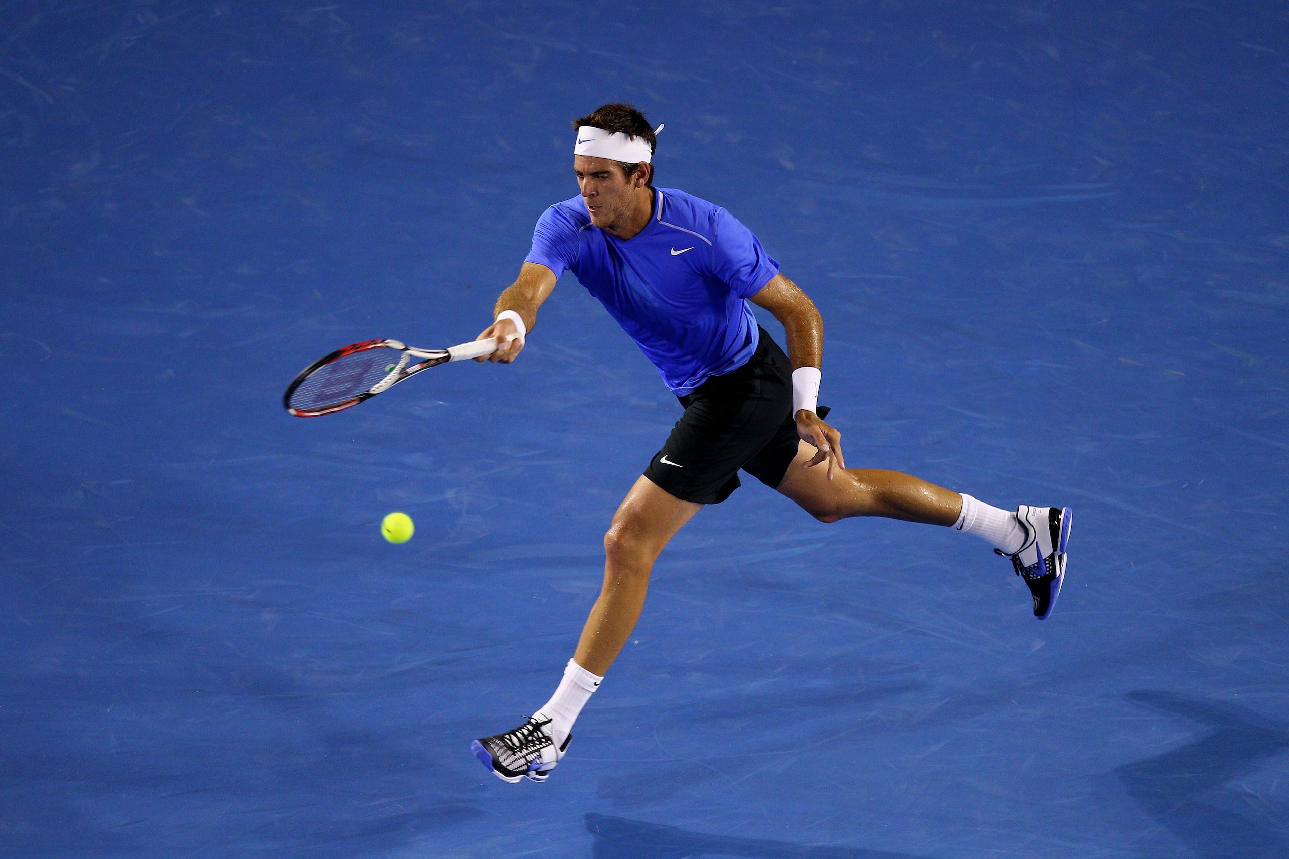 MELBOURNE, AUSTRALIA - JANUARY 20:  Juan Martin Del Potro of Argentina plays a forehand in his second round match against Marcos Baghdatis of Cyprus during day four of the 2011 Australian Open at Melbourne Park on January 20, 2011 in Melbourne, Australia.