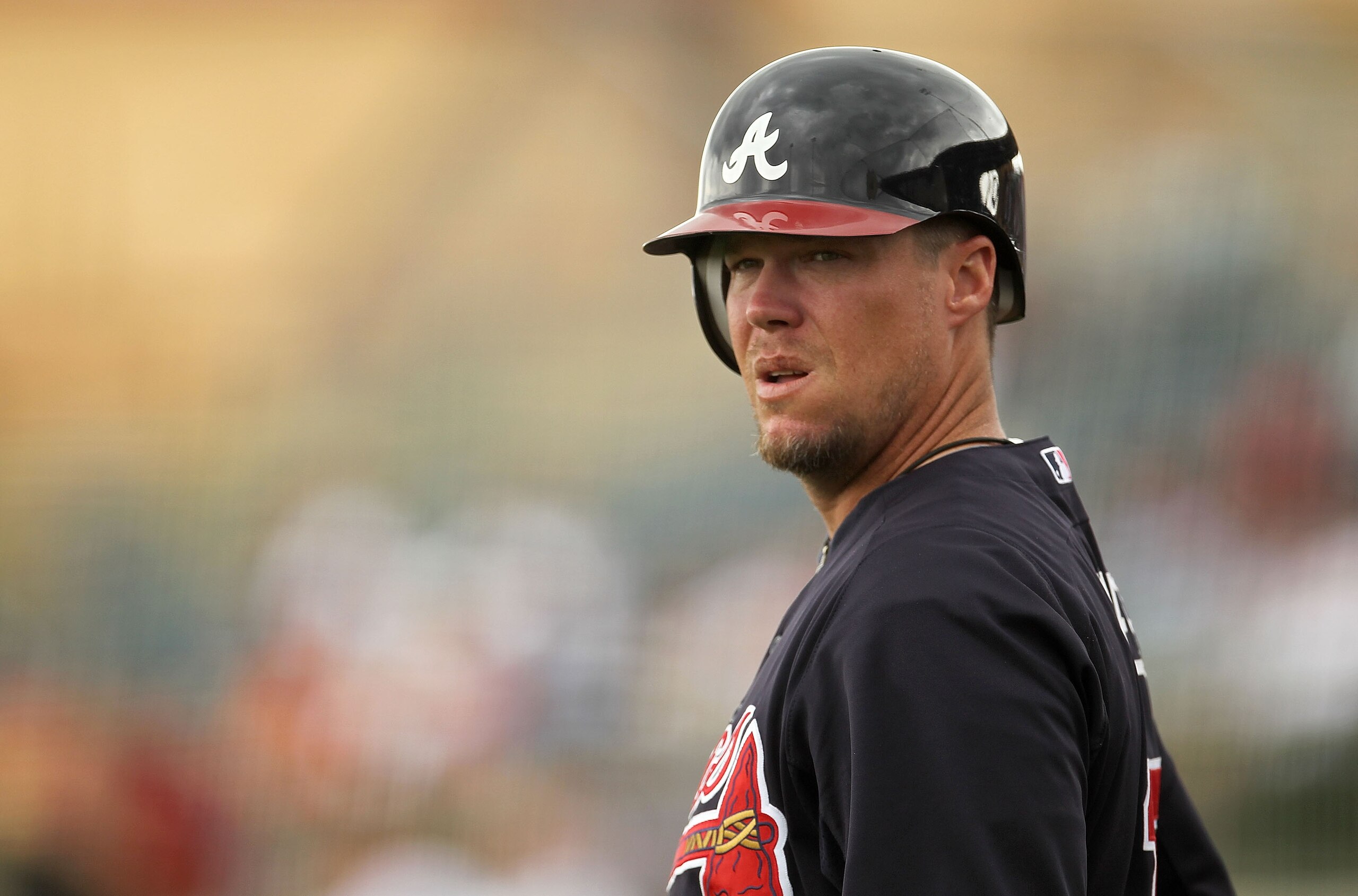 KISSIMMEE, FL - MARCH 01:  Chipper Jones #10 of the Atlanta Braves looks on during a Spring Training game against the Houston Astros at Osceola County Stadium on March 1, 2011 in Kissimmee, Florida.  (Photo by Mike Ehrmann/Getty Images)