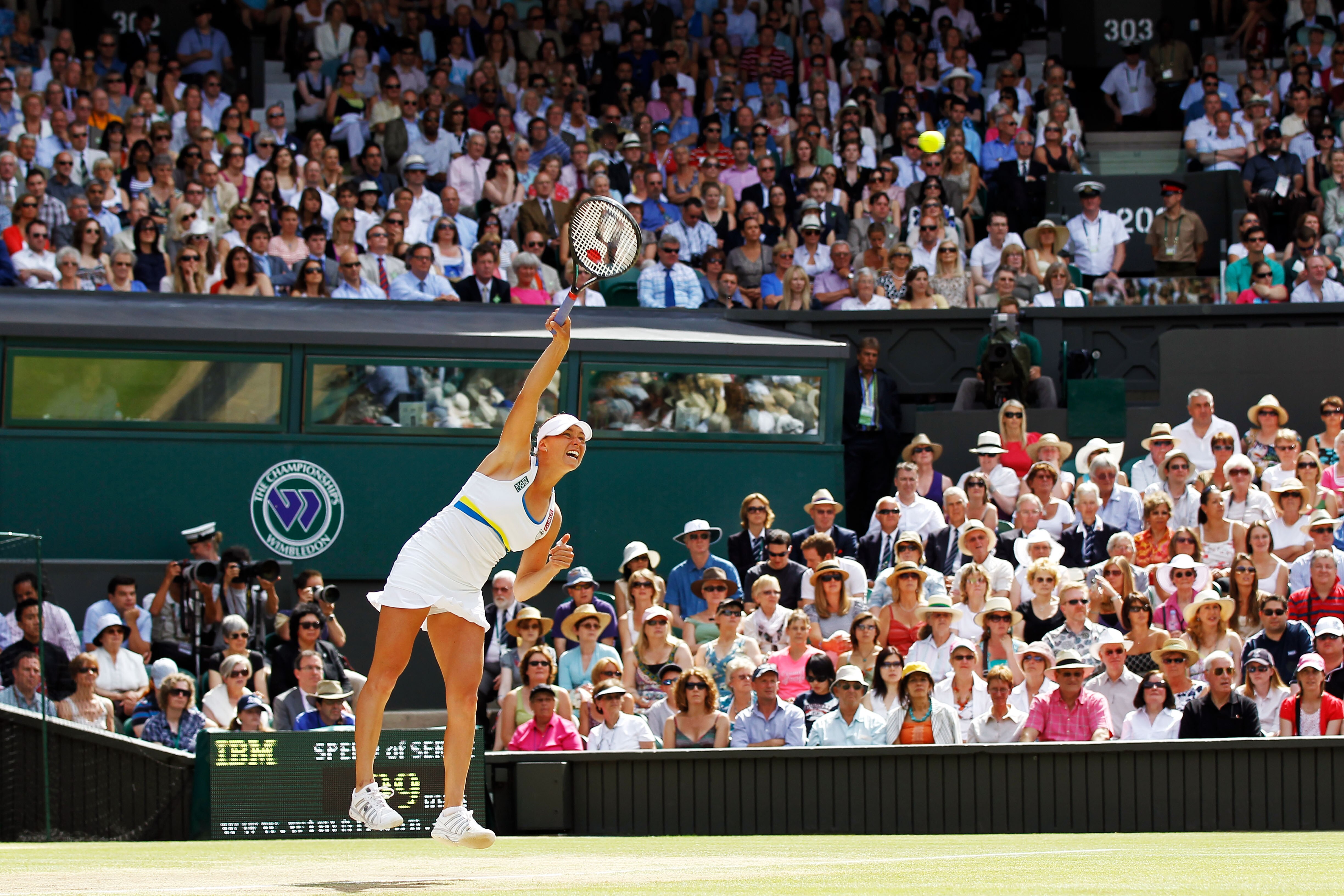 LONDON, ENGLAND - JULY 03:  Vera Zvonareva of Russia serves during the Ladies Singles Final Match against Serena Williams of USA on Day Twelve of the Wimbledon Lawn Tennis Championships at the All England Lawn Tennis and Croquet Club on July 3, 2010 in Lo