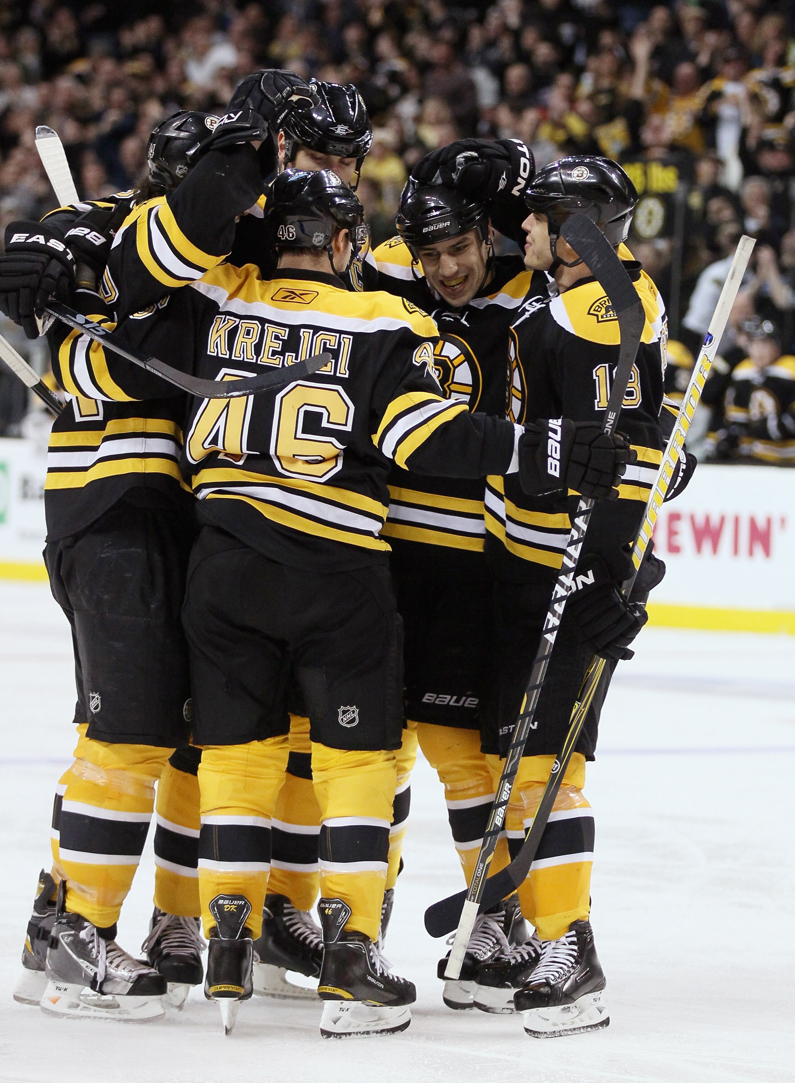 BOSTON, MA - MARCH 24:  Zdeno Chara #33,Milan Lucic #17,Nathan Horton #18 and David Krejci #46 of the Boston Bruins celebrate a goal in the third period against the Montreal Canadiens on March 24, 2011 at the TD Garden in Boston, Massachusetts.  The Bosto