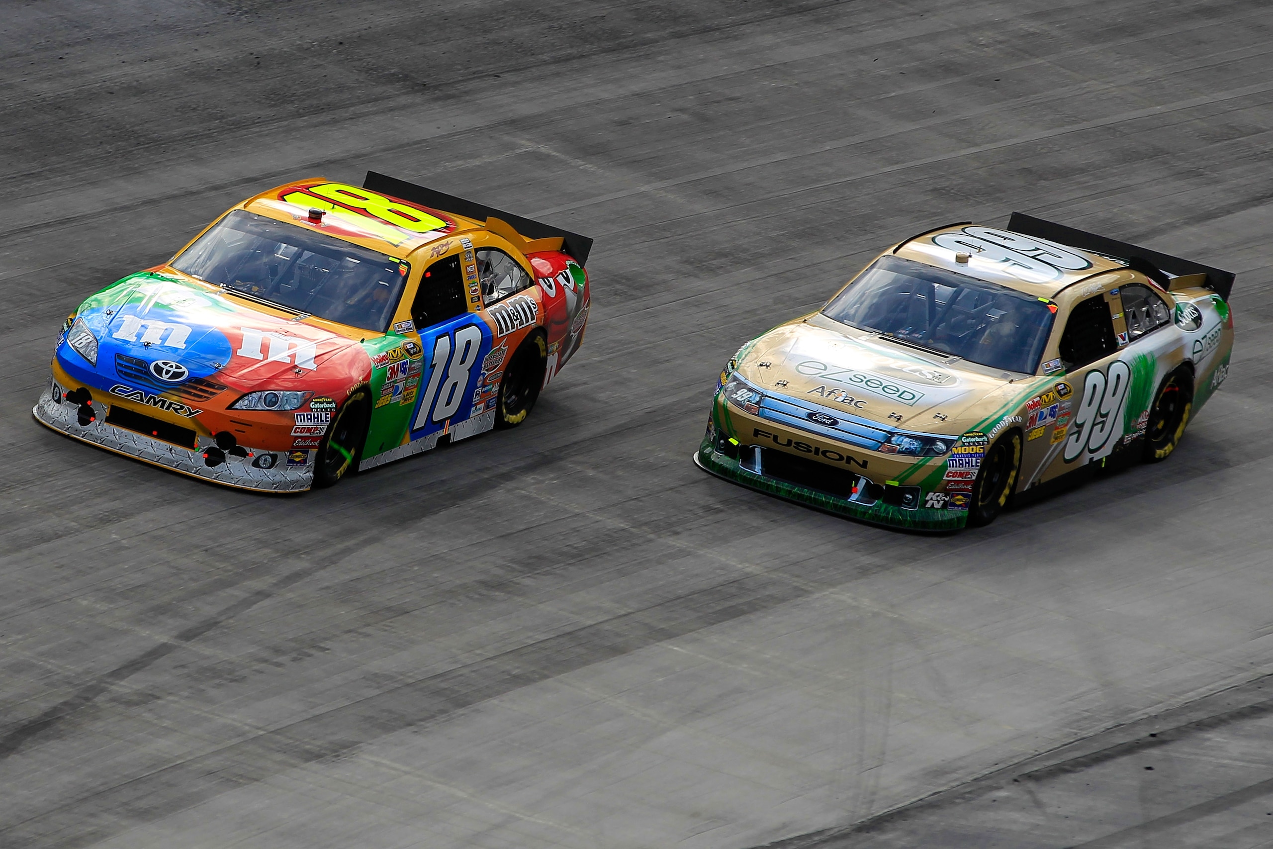 BRISTOL, TN - MARCH 20: Kyle Busch, driver of the #18 M&M'sToyota, leads Carl Edwards, driver of the #99 Aflac Ford, during the NASCAR Sprint Cup Series Jeff Byrd 500 Presented By Food City at Bristol Motor Speedway on March 20, 2011 in Bristol, Tennesse BRISTOL, TN - MARCH 20: Kyle Busch, driver of the #18 M&M'sToyota, leads Carl Edwards, driver of the #99 Aflac Ford, during the NASCAR Sprint Cup Series Jeff Byrd 500 Presented By Food City at Bristol Motor Speedway on March 20, 2011 in Bristol, Tennesse