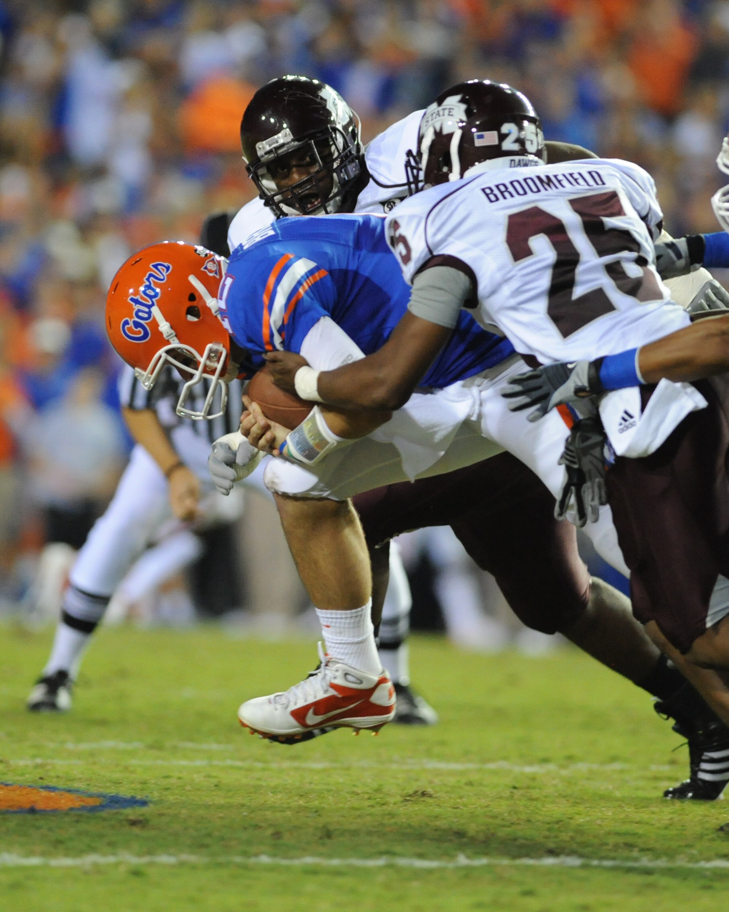 GAINESVILLE, FL - OCTOBER 16:  Quarterback John Brantley #12 of the Florida Gators is sacked by the Mississippi State Bulldogs October 16, 2010 Ben Hill Griffin Stadium at Gainesville, Florida.  (Photo by Al Messerschmidt/Getty Images)