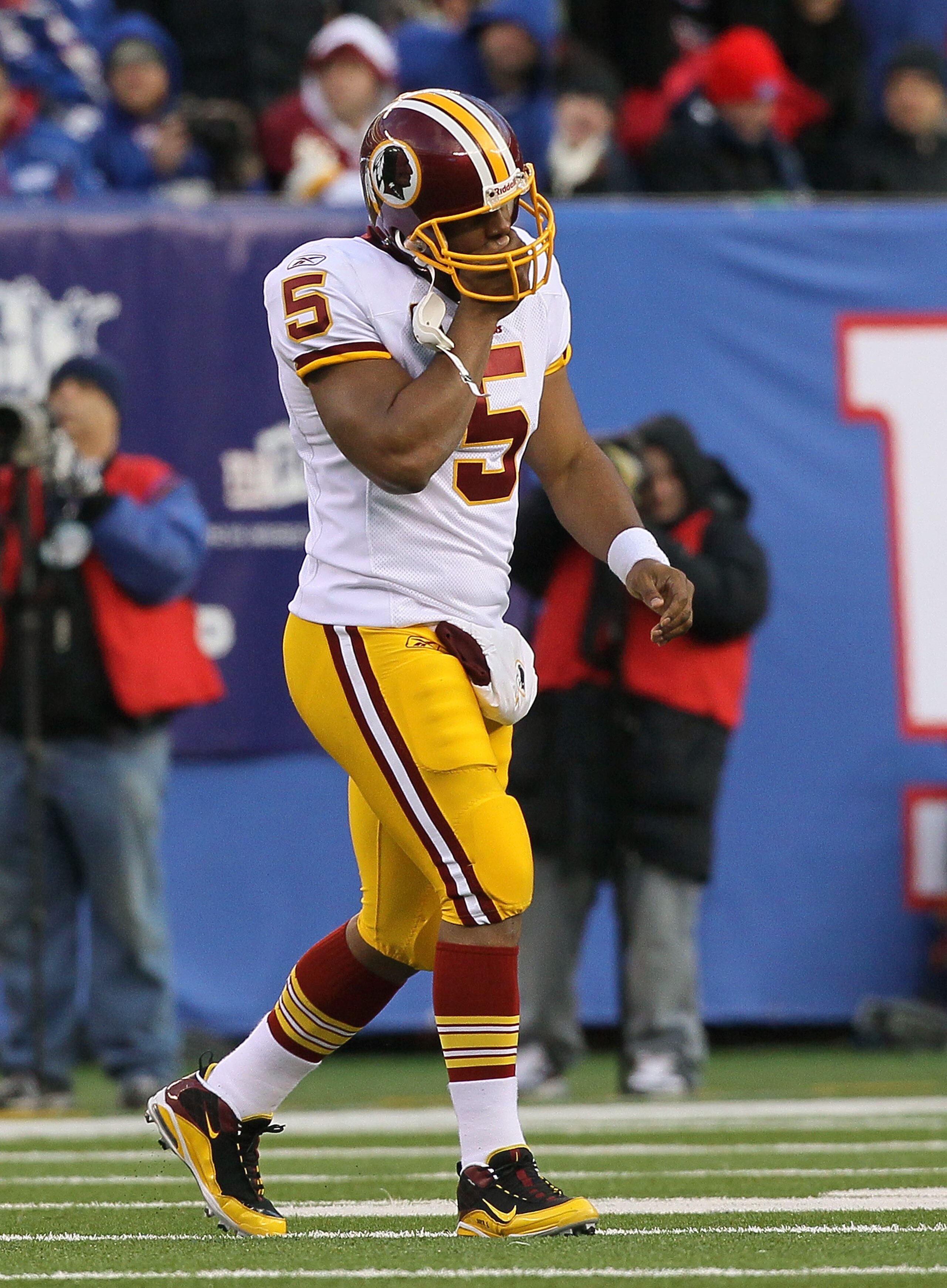 EAST RUTHERFORD, NJ - DECEMBER 05: Donovan McNabb #5 of the Washington Redskins walks back to the sidelines after throwing a fourth quarter interception agianst the New York Giants on December 5, 2010 at the New Meadowlands Stadium in East Rutherford, Ne EAST RUTHERFORD, NJ - DECEMBER 05: Donovan McNabb #5 of the Washington Redskins walks back to the sidelines after throwing a fourth quarter interception agianst the New York Giants on December 5, 2010 at the New Meadowlands Stadium in East Rutherford, Ne